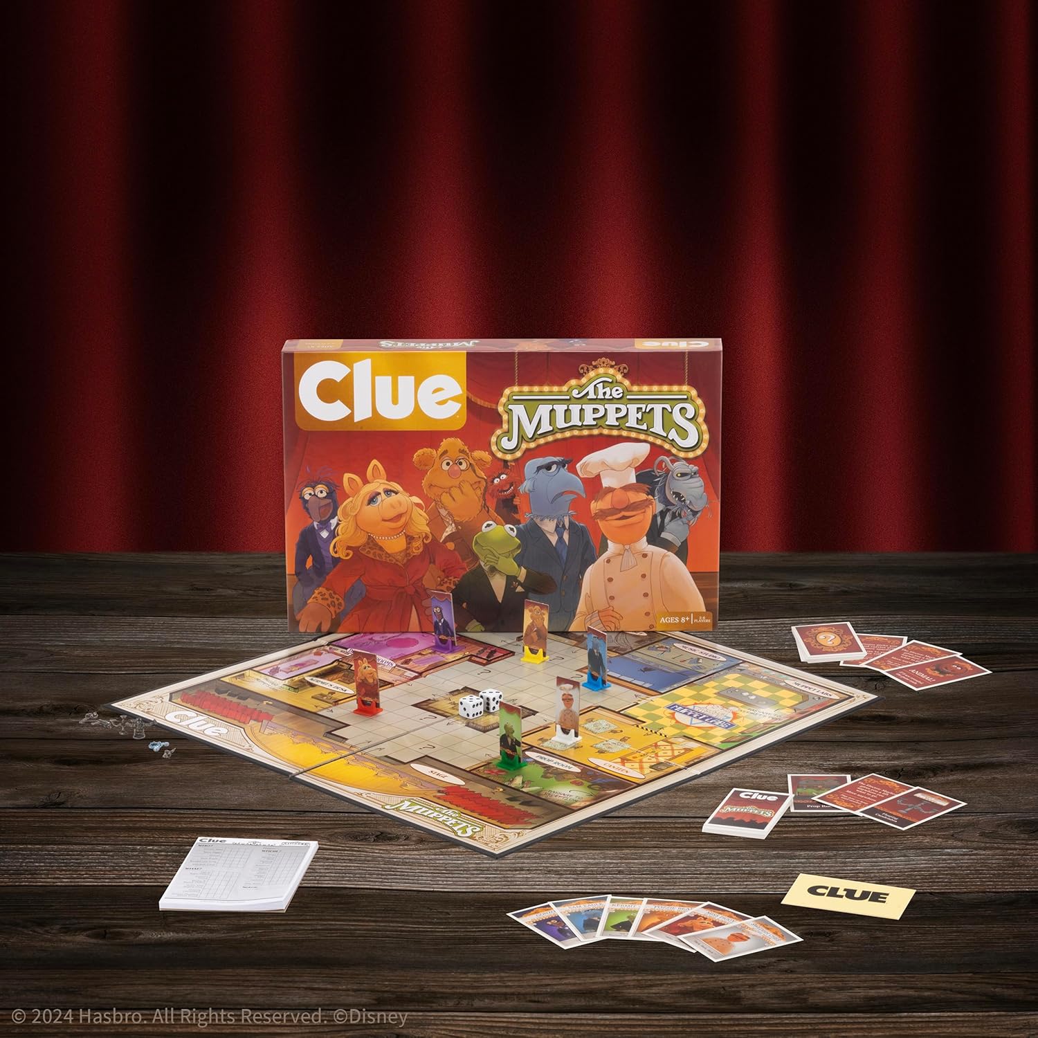 CLUE: The Muppets, Classic Board Game, Solve The Mystery in The Muppet Theater with Kermit, Fozzie, & More, Discover Who, Where, and What Weapon was Used, Officially Licensed The Muppets Merchandise