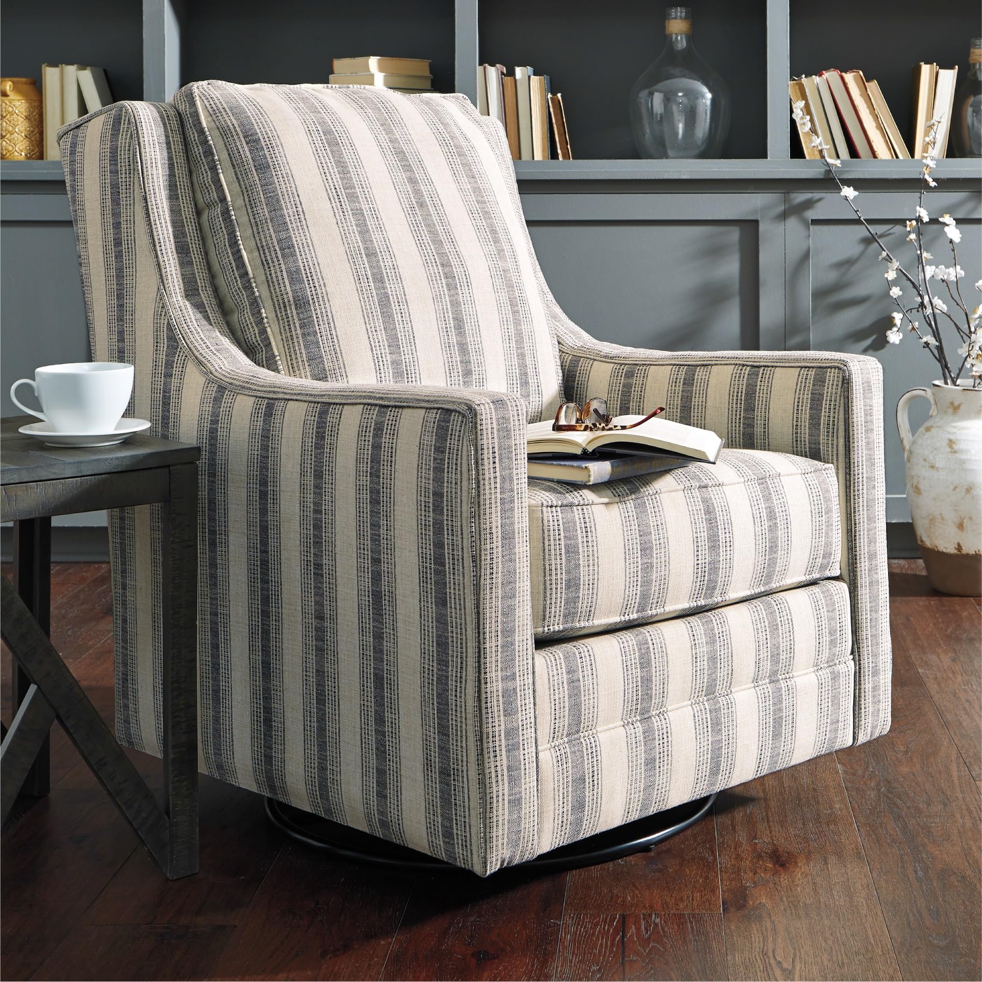 (PAIR of Glider Chairs.) Signature Design by Ashley Kambria Striped Upholstered Swivel Accent Glider Chair, Ivory & Black (BID IS PER CHAIR, LOT IS FOR 2 CHAIRS TOTAL.)