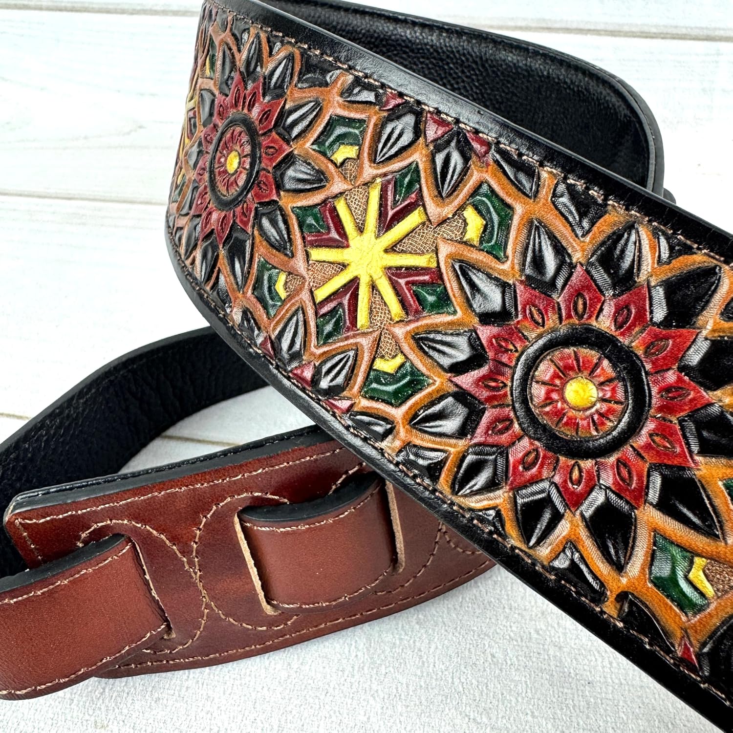 Walker & Williams LIH-2 Black And Brown Hand Carved Premium Leather Guitar Strap With Gold Earth Zodiac Star Design And Premium Padded Back For Acoustic, Electric, And Bass Guitars