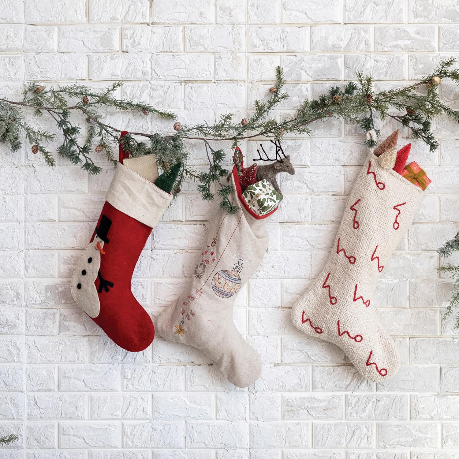 Creative Co-Op, Multicolor Cotton and Linen Stocking with Embroidered Ornaments and Red Edge