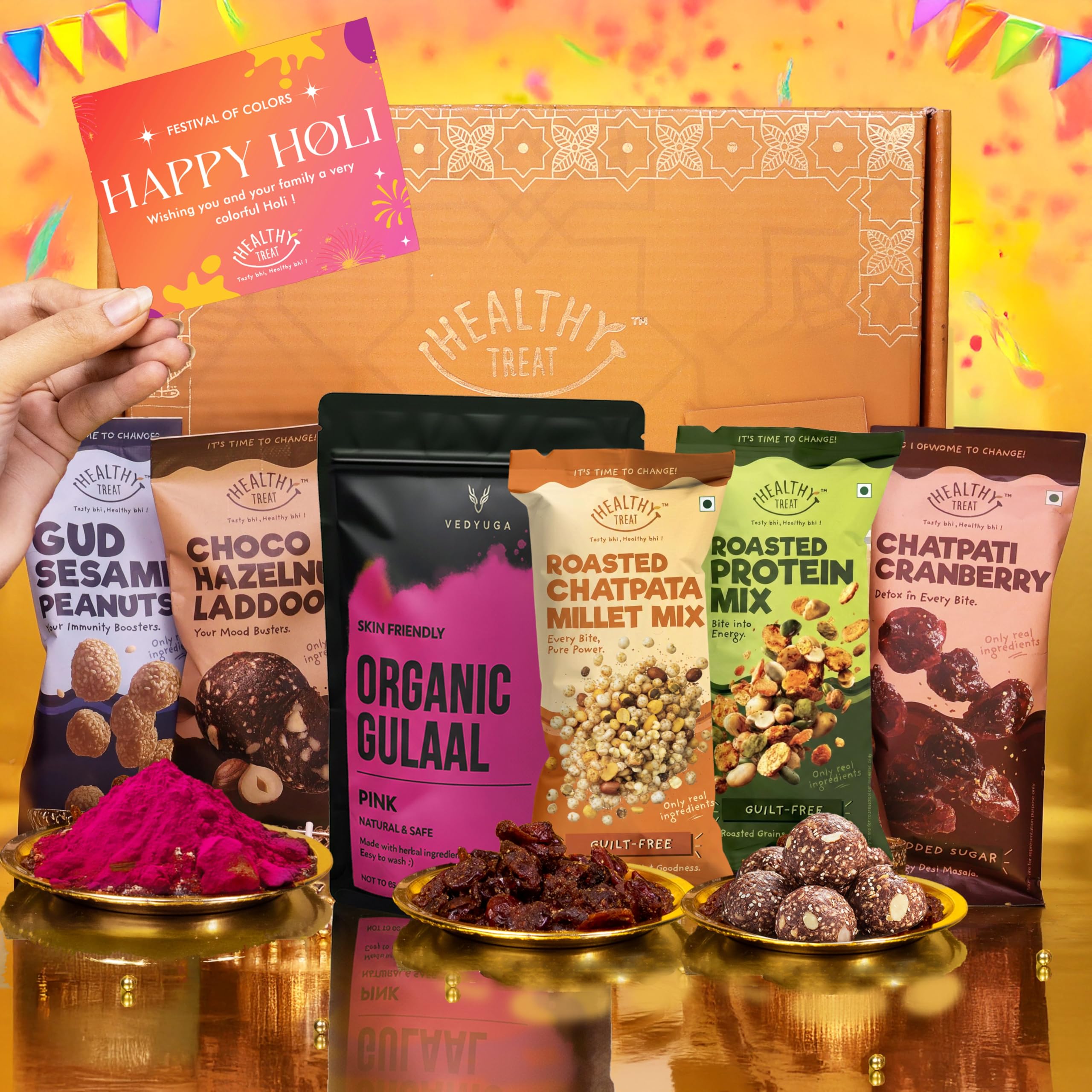 Healthy Treat Wholesome Treats Holi Gift Hamper | Roasted Healthy Snacks, Hazelnut Laddoo, Herbal Gulal & Holi' Greeting Card | Holi Gift | Perfect Holi-Gift's for Family & Friends