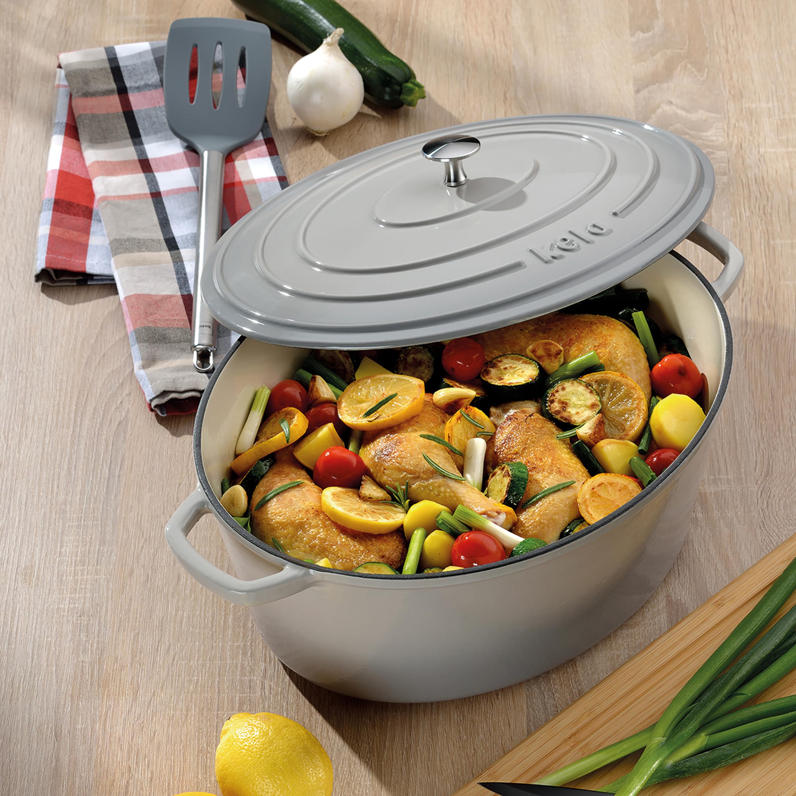 kela Bräter Gusseisen oval 9,3 Liter, Dutch Oven CALIDO, Induktion Gussbräter mit Deckel backofengeeignet, Gusseisen Topf emailliert, hellgrau