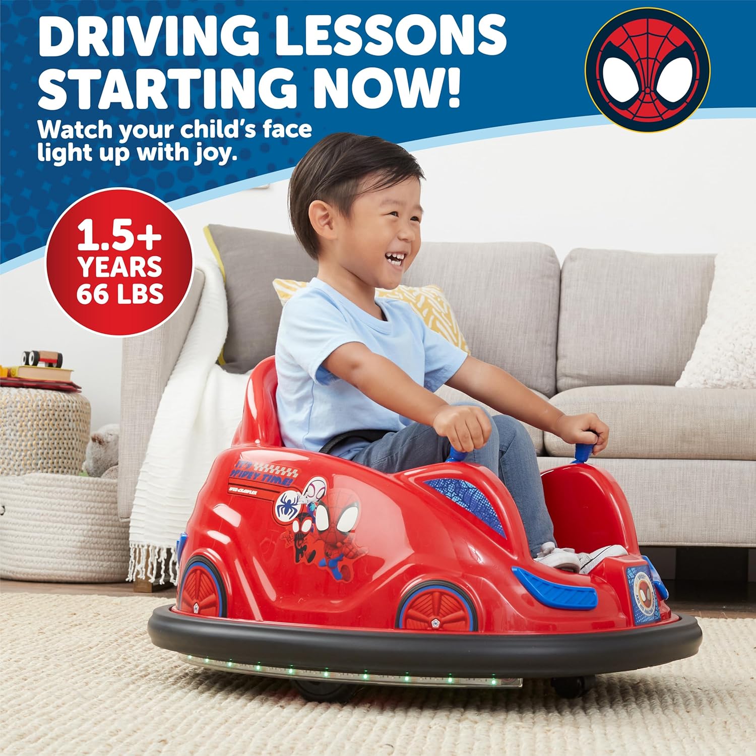 A child smiling while seated in the Flybar Marvel Spidey Bumper Car, with text 'Driving Lessons Starting Now! 1.5+ Years 66 LBS'.