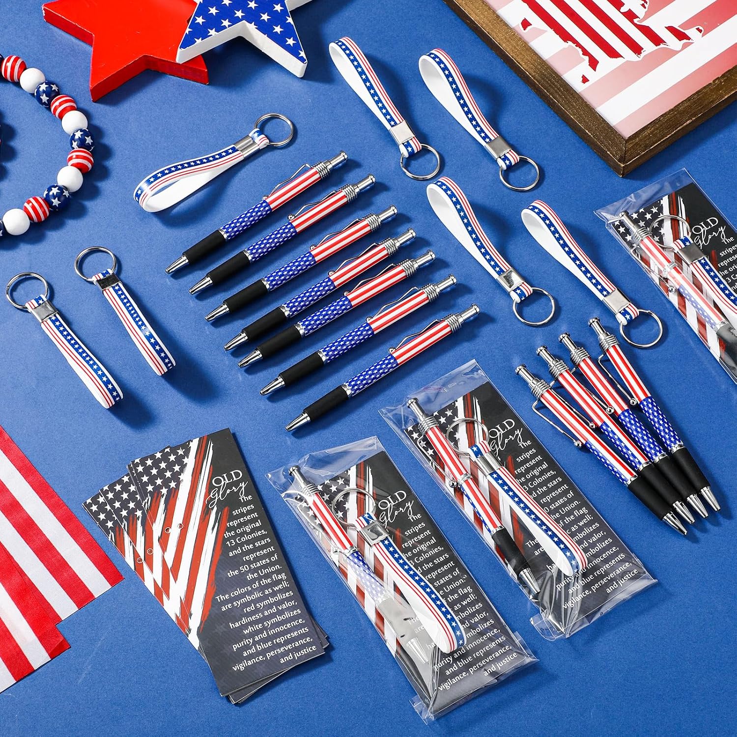 Sayglossy 250 Anniversary Veterans Day Gifts Bulk Patriotic Party Favor American Flag Ballpoint Pens USA Keychains Bookmarks for Memorial Day Souvenir Gifts(60 Pcs)