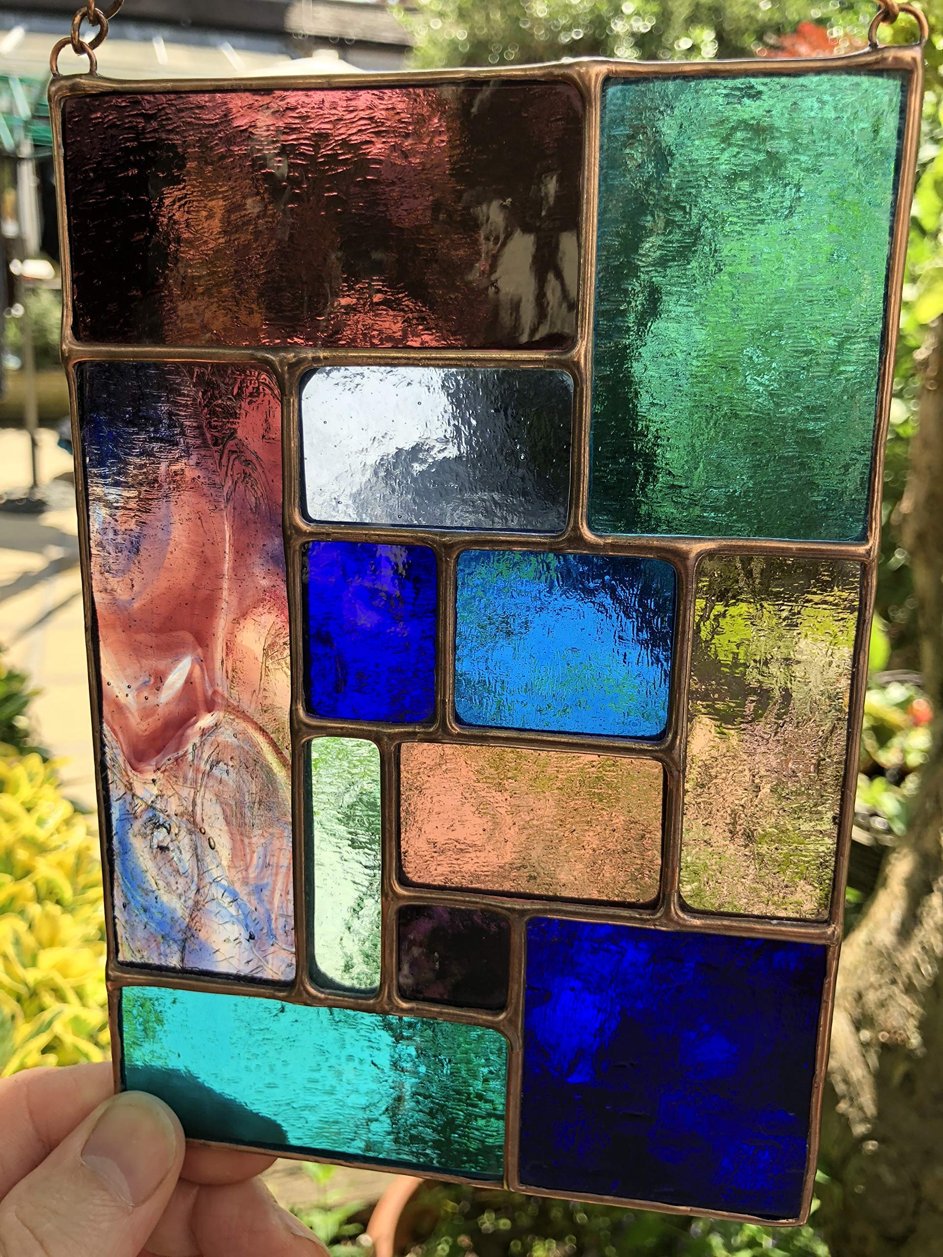 Pannello acchiappasole in vetro colorato, blu e viola, color rame, arte astratta