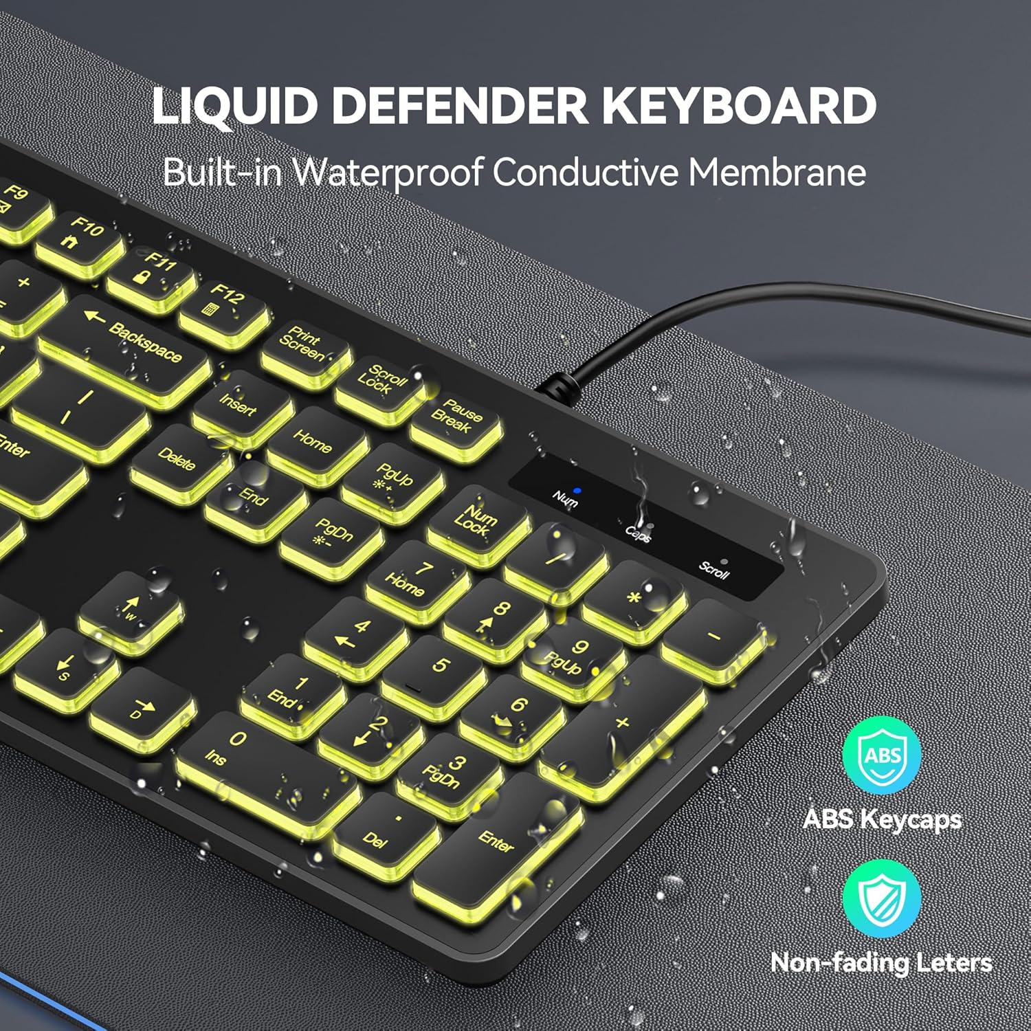 Keyboard with water droplets demonstrating spill-resistant feature