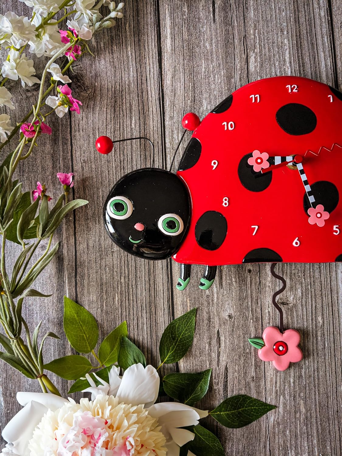 Enesco Allen Designs Dotty the Smiling Ladybug Sculpted Pendulum Wall Clock, 8.07 Inch, Multicolor