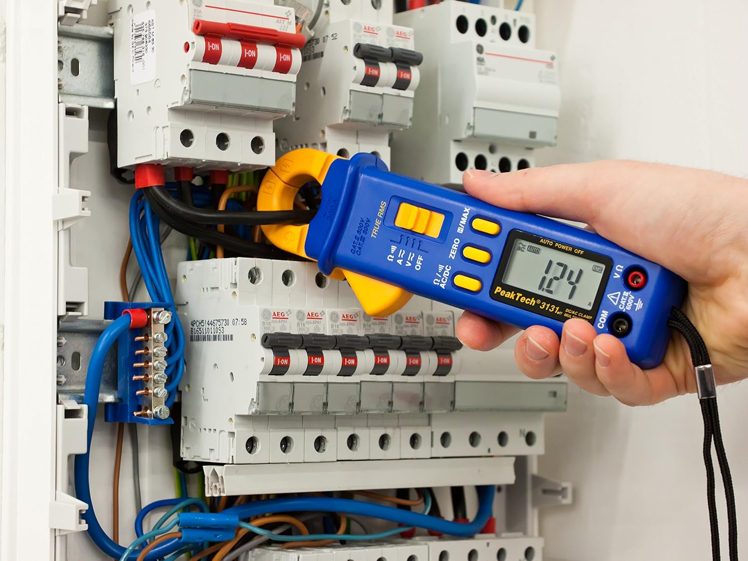 PeakTech P 3131 Clamp Meter measuring current in a circuit breaker box
