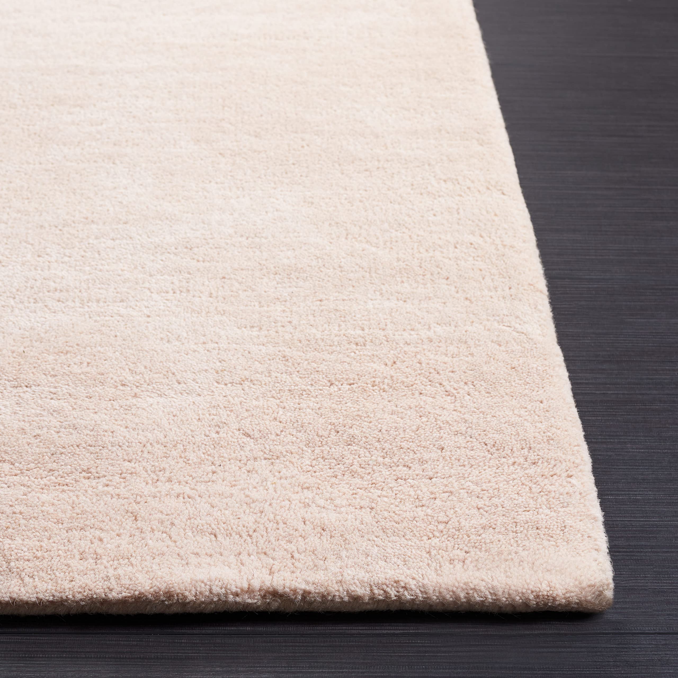 Tapis géométrique SAFAVIEH pour réchauffer un sol de salon