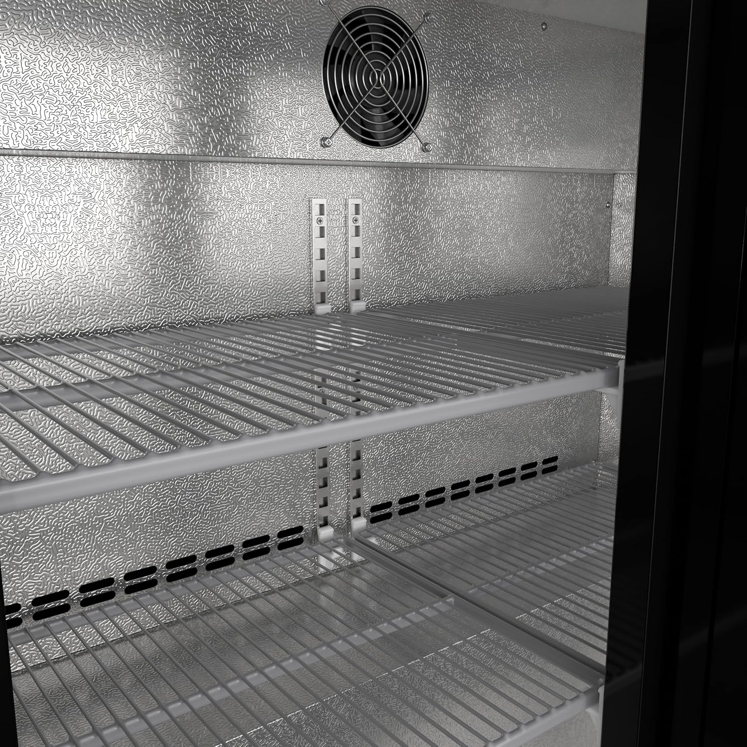 Taobh a-staigh view of the refrigerator showing adjustable shelves