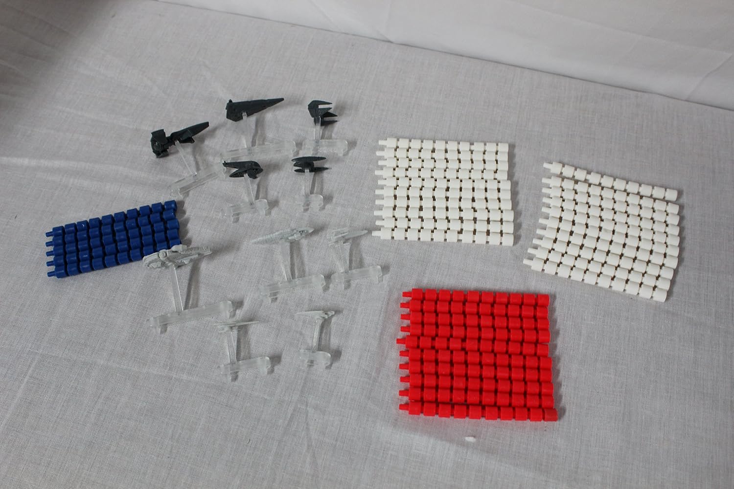 Star Wars Electronic Battleship game pieces including ships and pegs