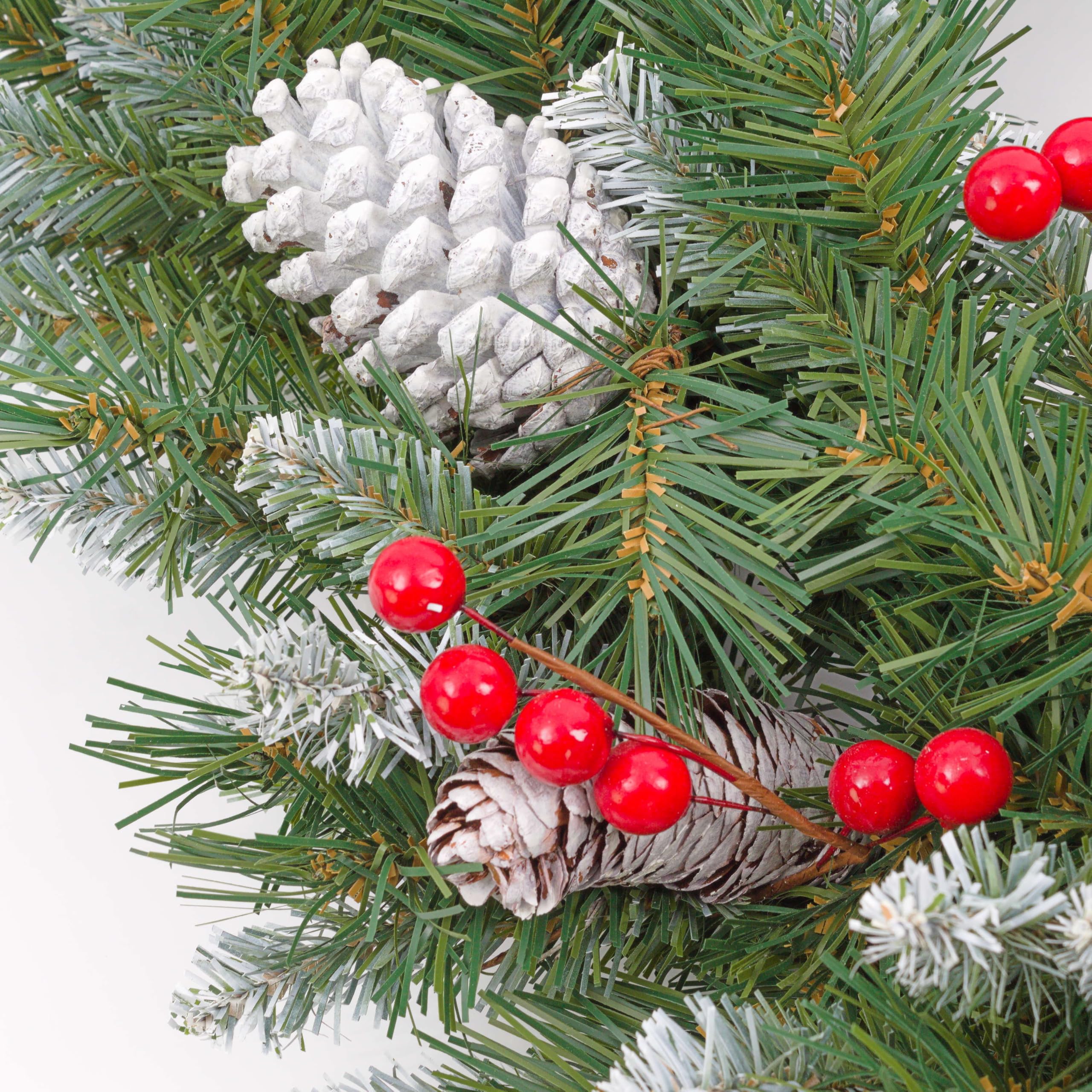 artplants.de Künstlicher Tannenkranz Marlies, Zapfen und Beeren, beschneit, Ø 55cm, schwer entflammbar, wetterfest - Kunst Weihnachtskranz