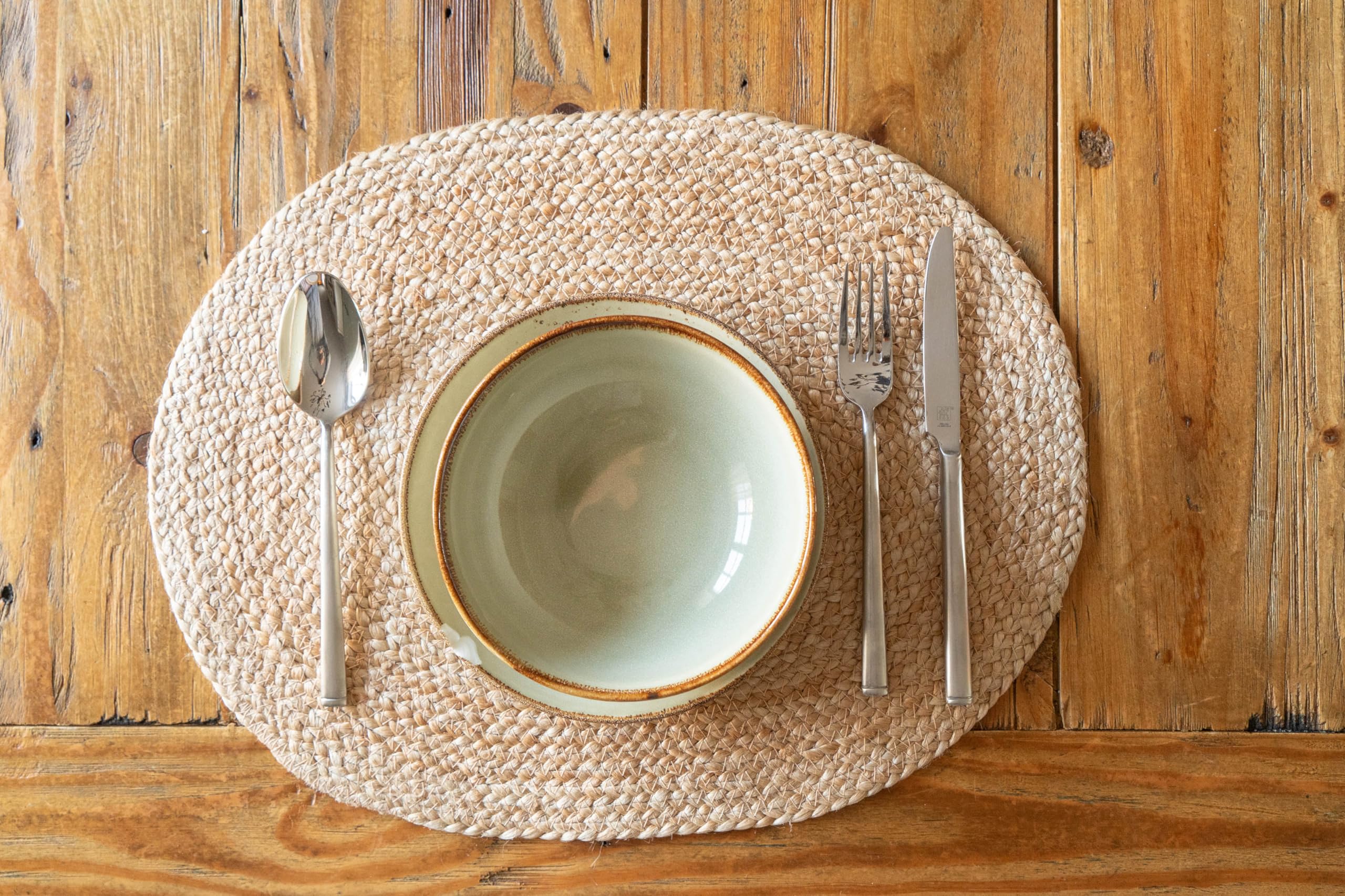 Decorasian Platzset aus Jute – 8 Stück - Platzteller oval geflochten – dekorative Platzdeckchen im Boho Stil