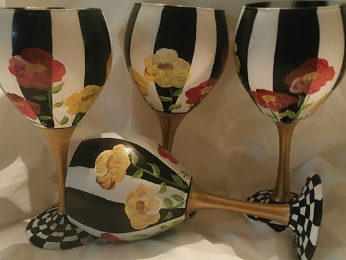 Amapolas rojas y amarillas pintadas a mano. Pintadas con rayas blancas y negras. Tallo dorado y base a cuadros. Este juego es muy bonito. Gran