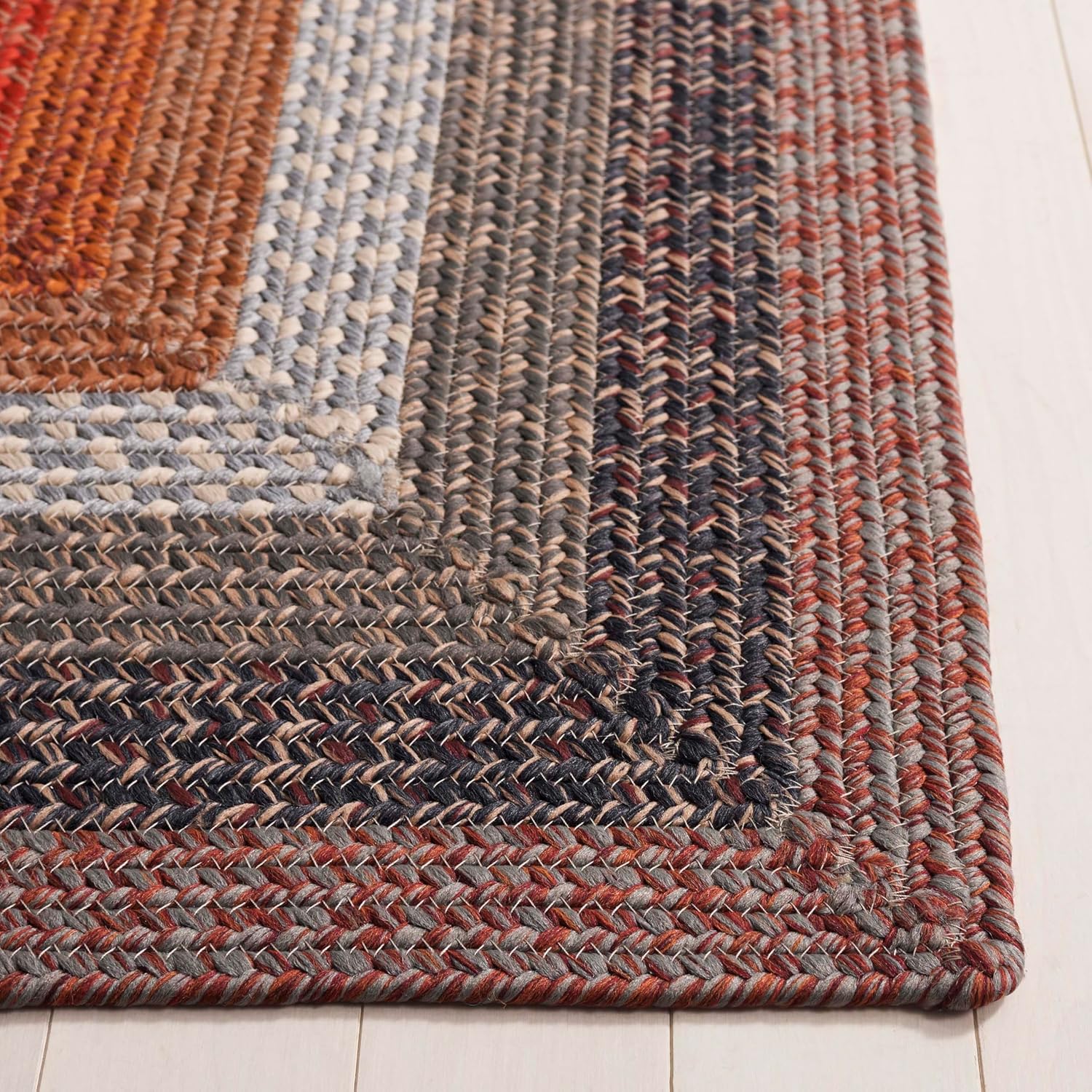 SAFAVIEH Washable Rug Outdoor Braided Collection - 6' x 9', Brown & Rust, Handmade & Reversible, Non-Shedding & Easy to Clean, Ideal for Patio, Backyard, Mudroom (BRD323T)