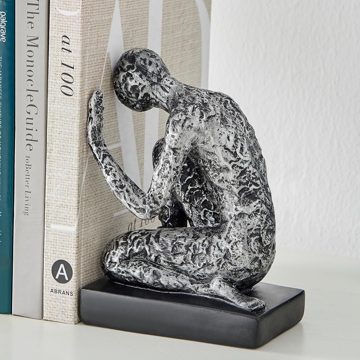 Danya B. Kneeling Figure Sculptures Polyresin Silver and Black Finish Bookend Set of 2