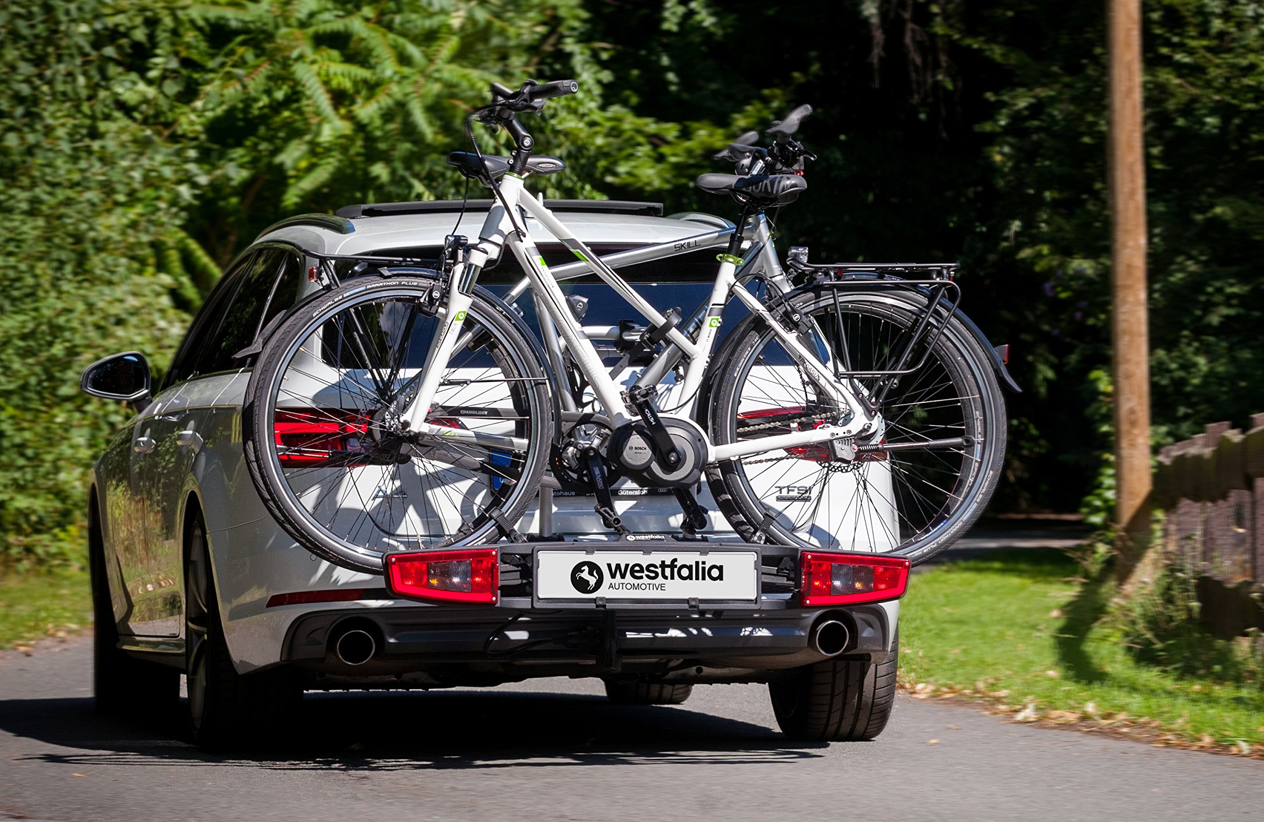 Westfalia Portabici Bikelander per Gancio di Traino, Borsa Inclusa, per 2 Biciclette, Adatto per E-bike, Ripiegabile Luci LED ibride