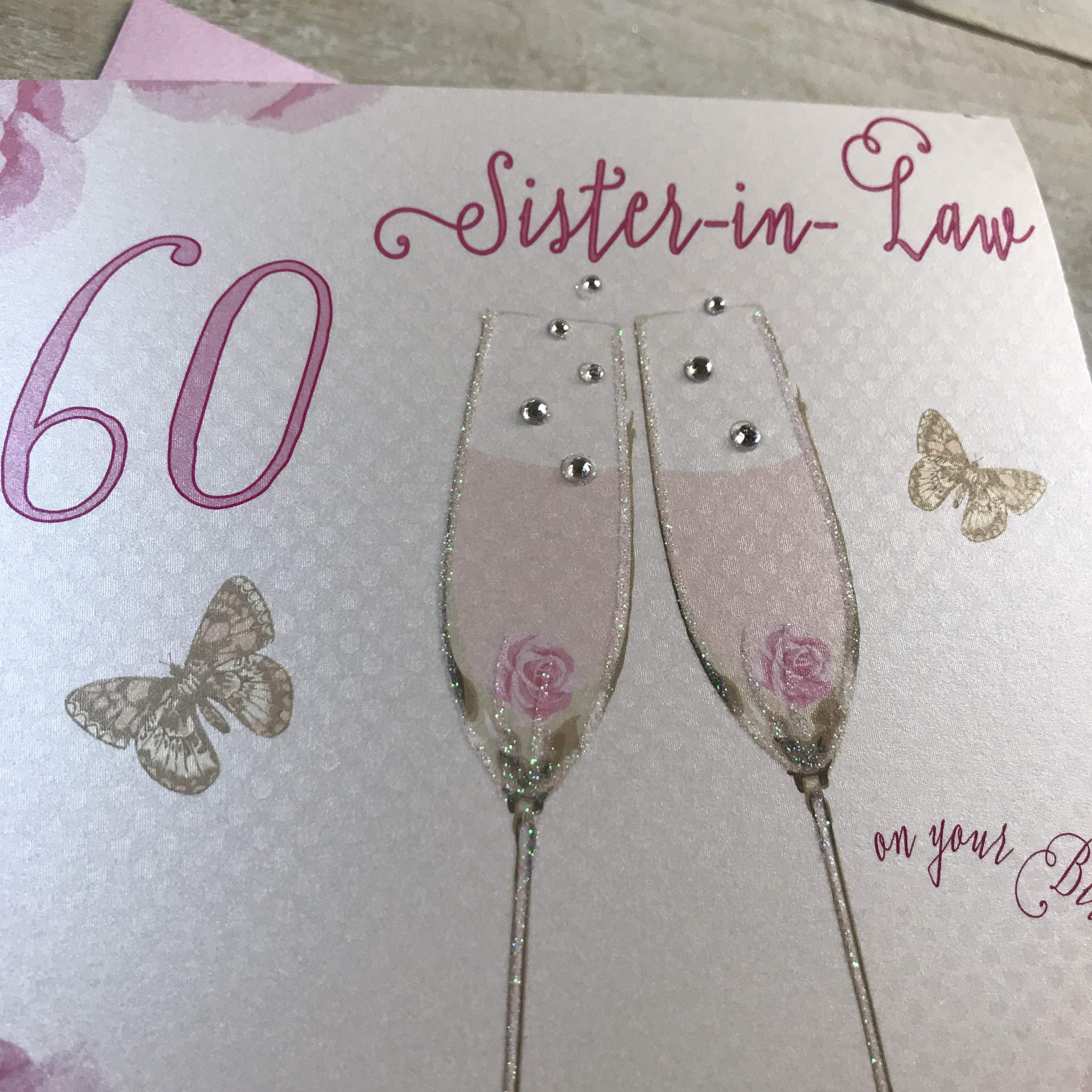 WHITE COTTON CARDS Happy 60th Birthday Card Sister-in-Law Champagne Glasses Pink & Gold Sparkly Cake SS42-SIL60