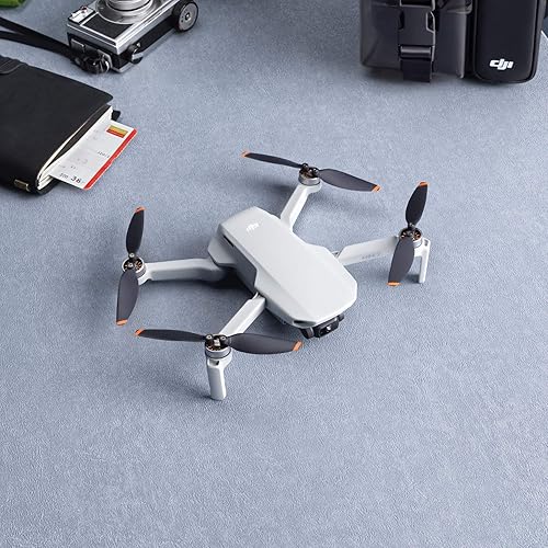 Miniatura 3 de DJI Mini 2 - Drone Quadcopter ultraligero y plegable, cardán de 3 ejes con cámara 4K, foto de 12MP, tiempo de vuelo de 31 minutos, transmisión de