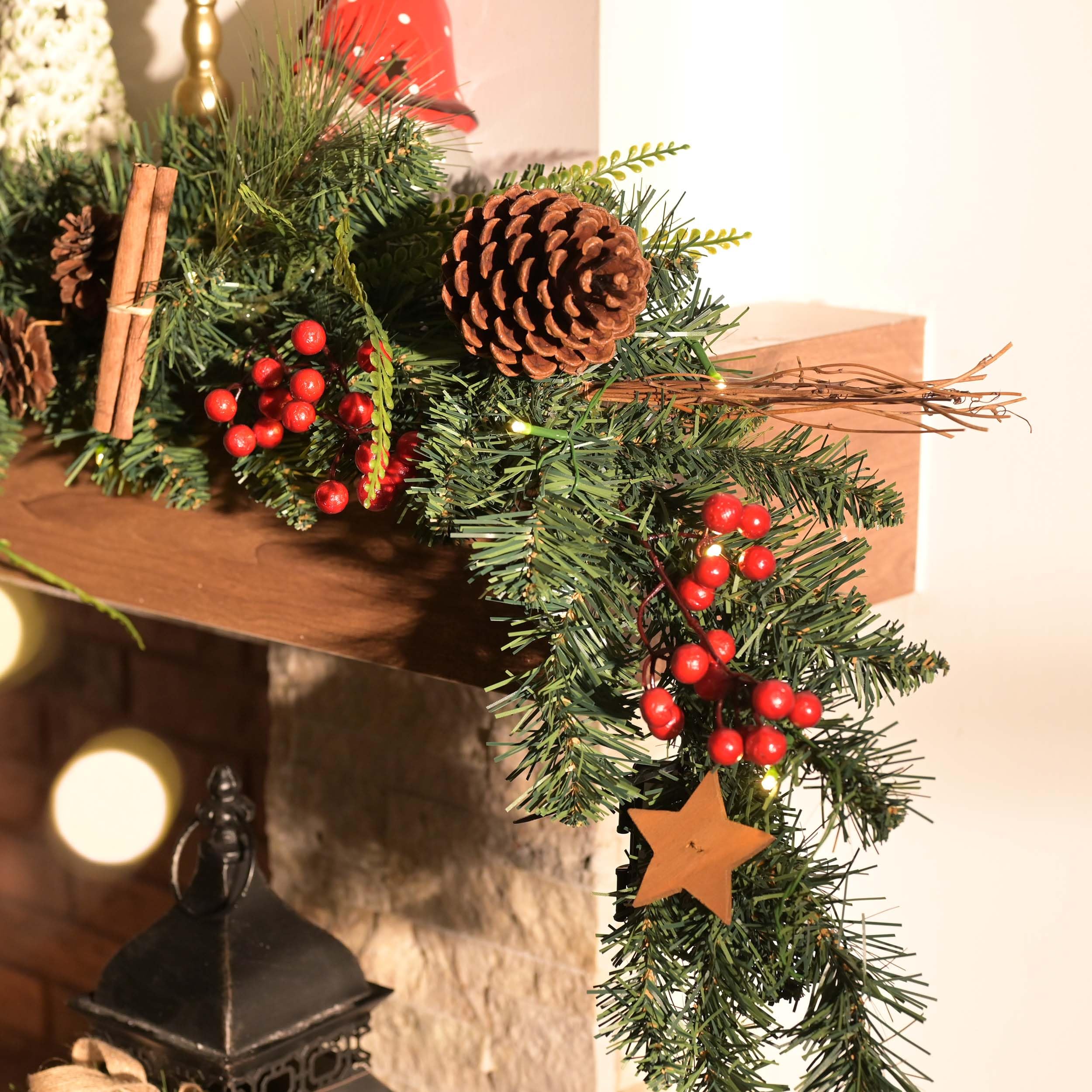 Valery Madelyn EG0202-0113 Guirlande de Noël en plastique avec 20 LED éclairées à piles - Décoration de Noël avec fonction minuterie - Guirlande d'étoiles en bois pour l'extérieur - Vert et rouge