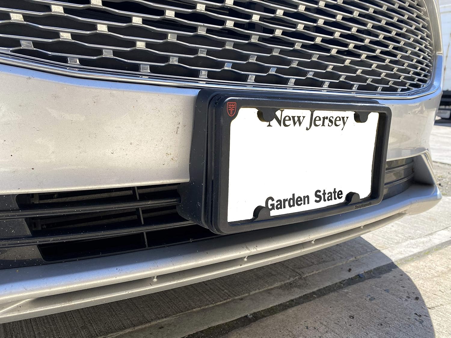 TN TrunkNets Inc A NASA-Like Rubber Front License Plate Frame Tag Holder Guard Bumper for Ford