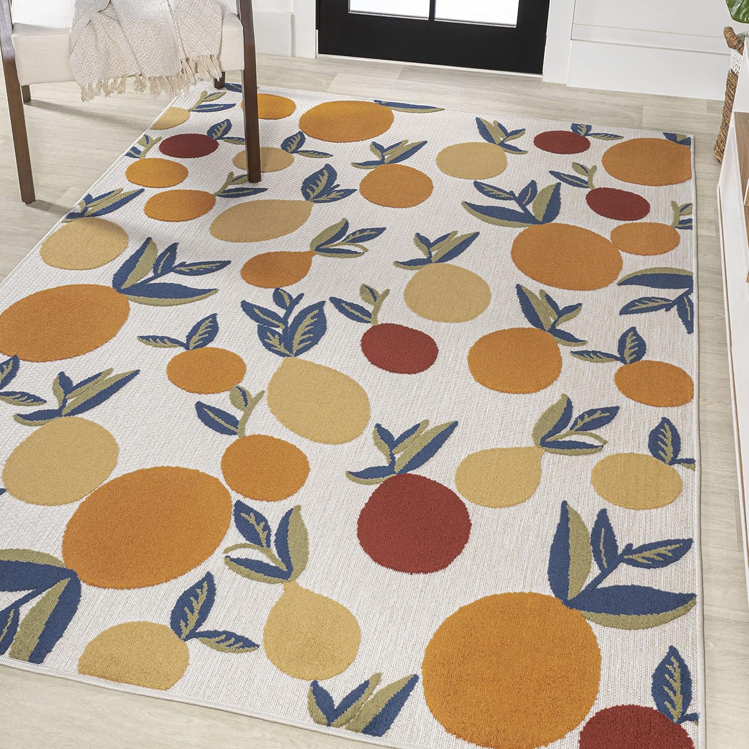 4' x 6' Ivory and Orange Floral Synthetic Area Rug
