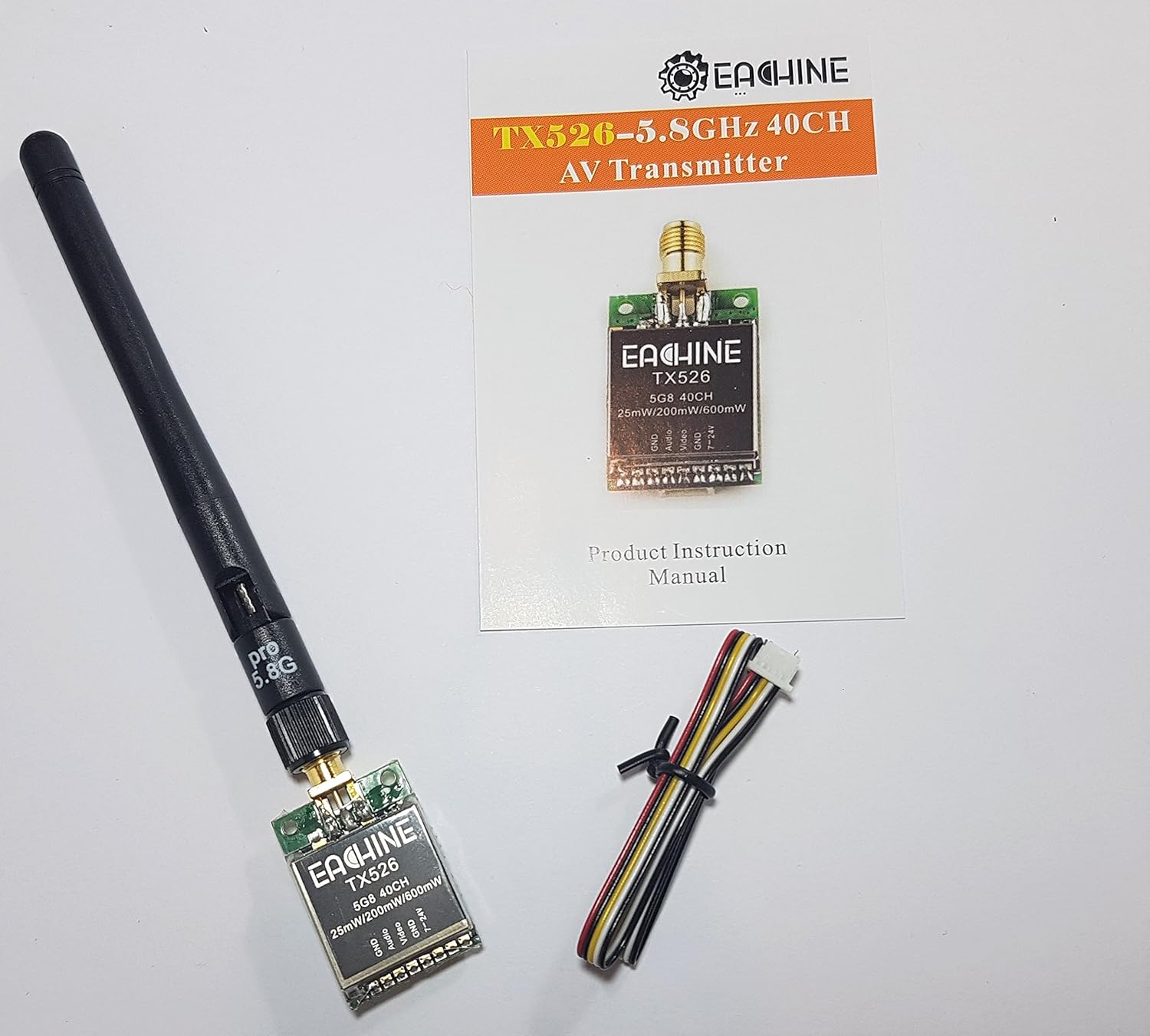 EACHINE TX526 FPV Transmitter, antenna, and connection cable with instruction manual