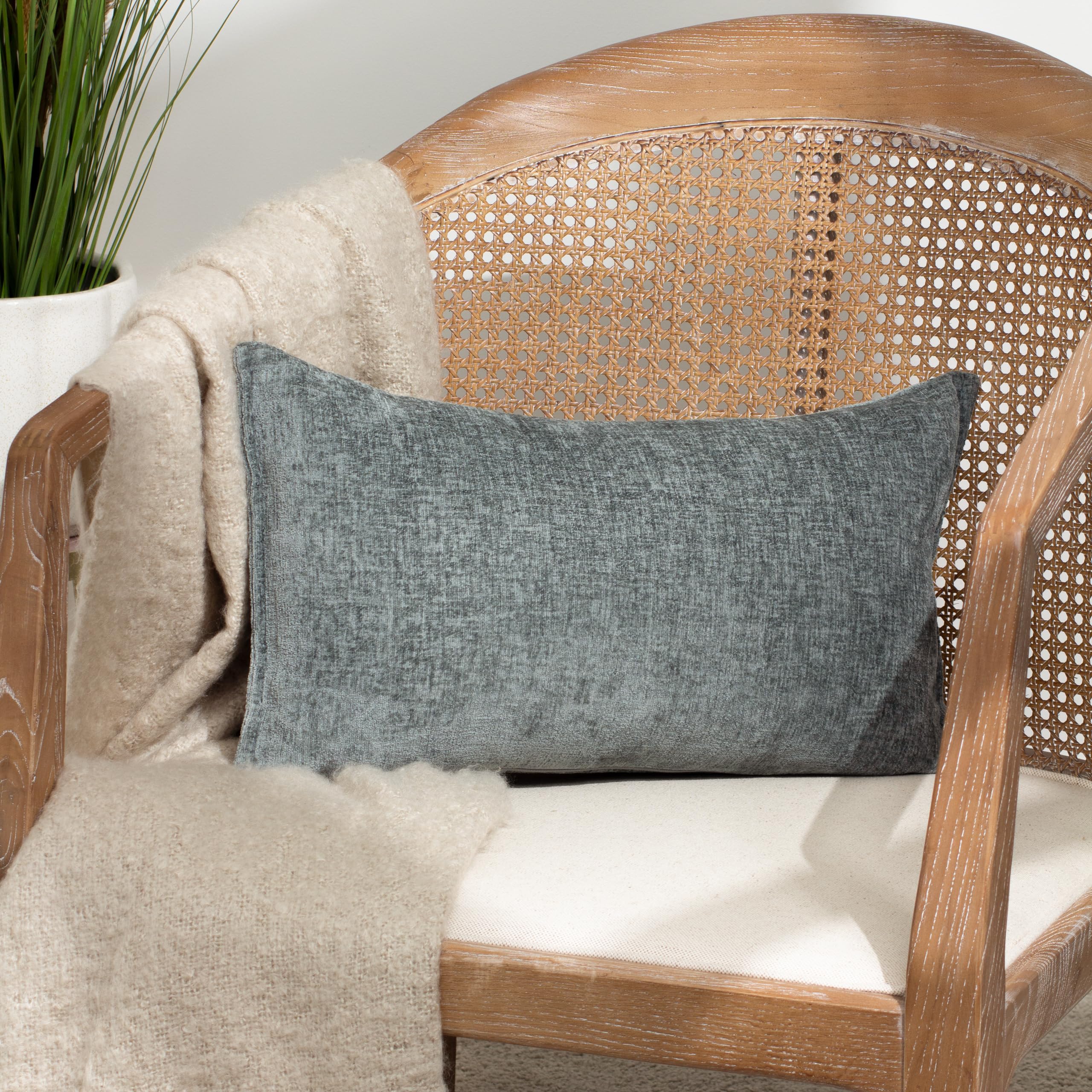 Evans Lichfield Buxton Reversible Feather Rich Cushion from B&Q