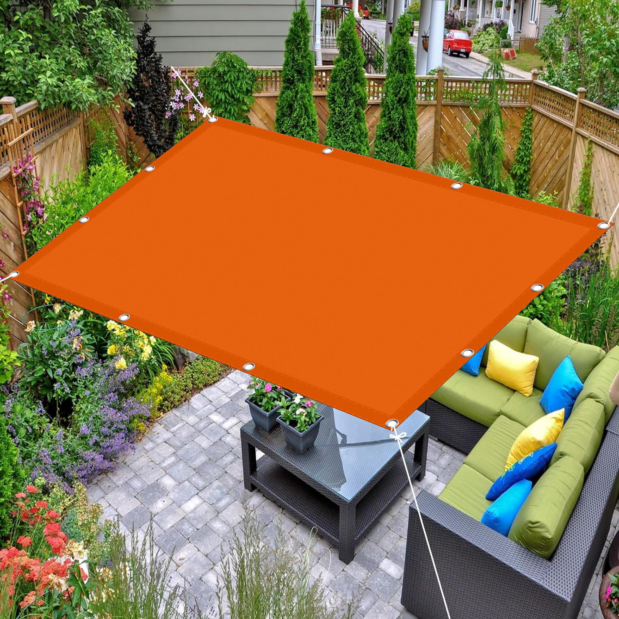 Toile ombrage jardin orange pour protéger le balcon du soleil