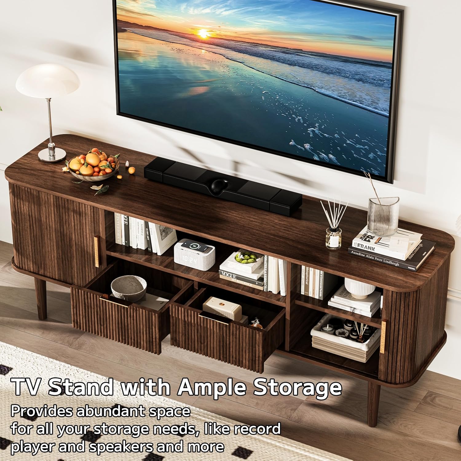 TV stand with drawers pulled open, revealing ample storage space.
