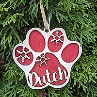 Vista 5 de Adorno de Navidad personalizado con estampado de patas, el nombre de tu mascota y colores a elegir, perro o gato