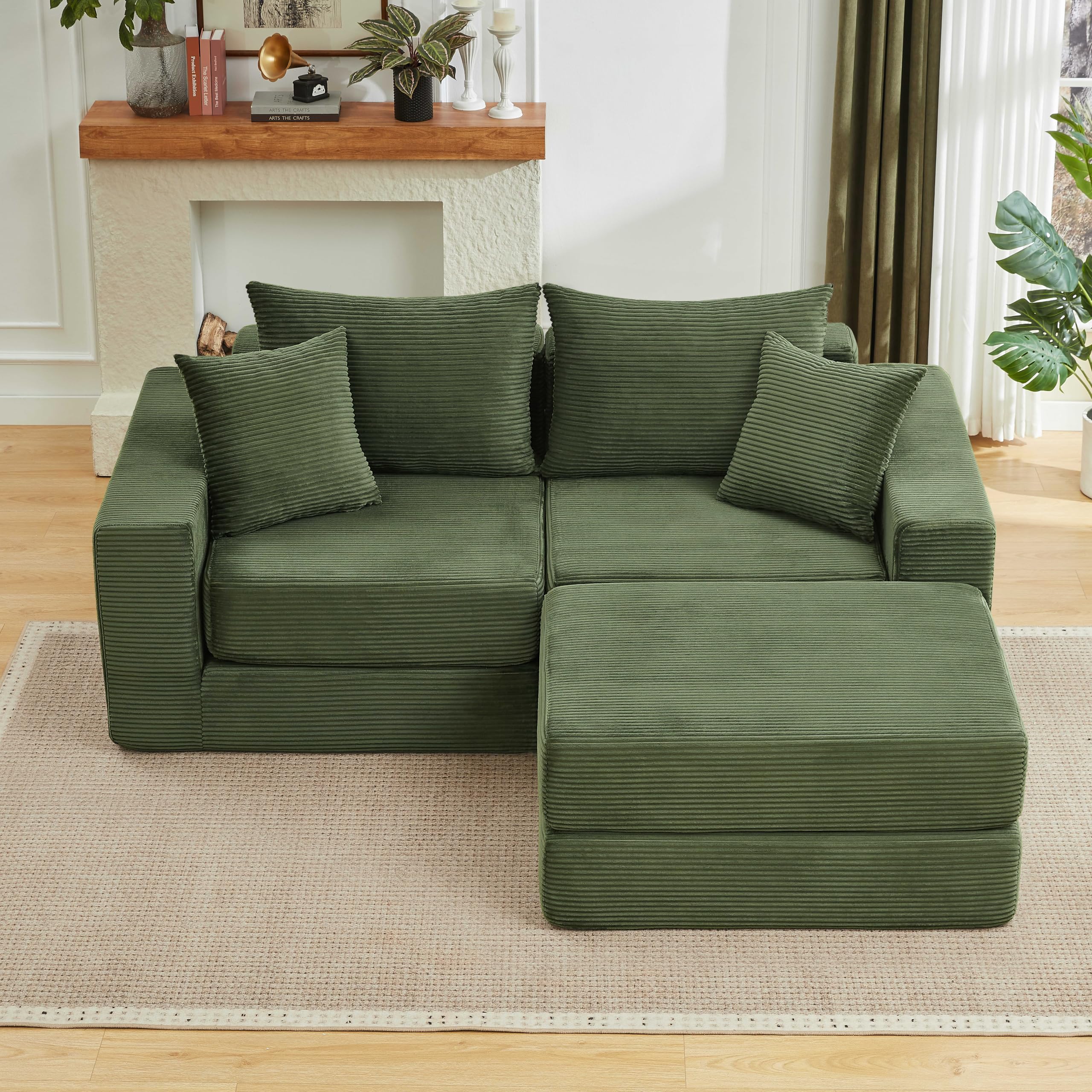 Sofá modular Cloud Boneless verde con base antideslizante