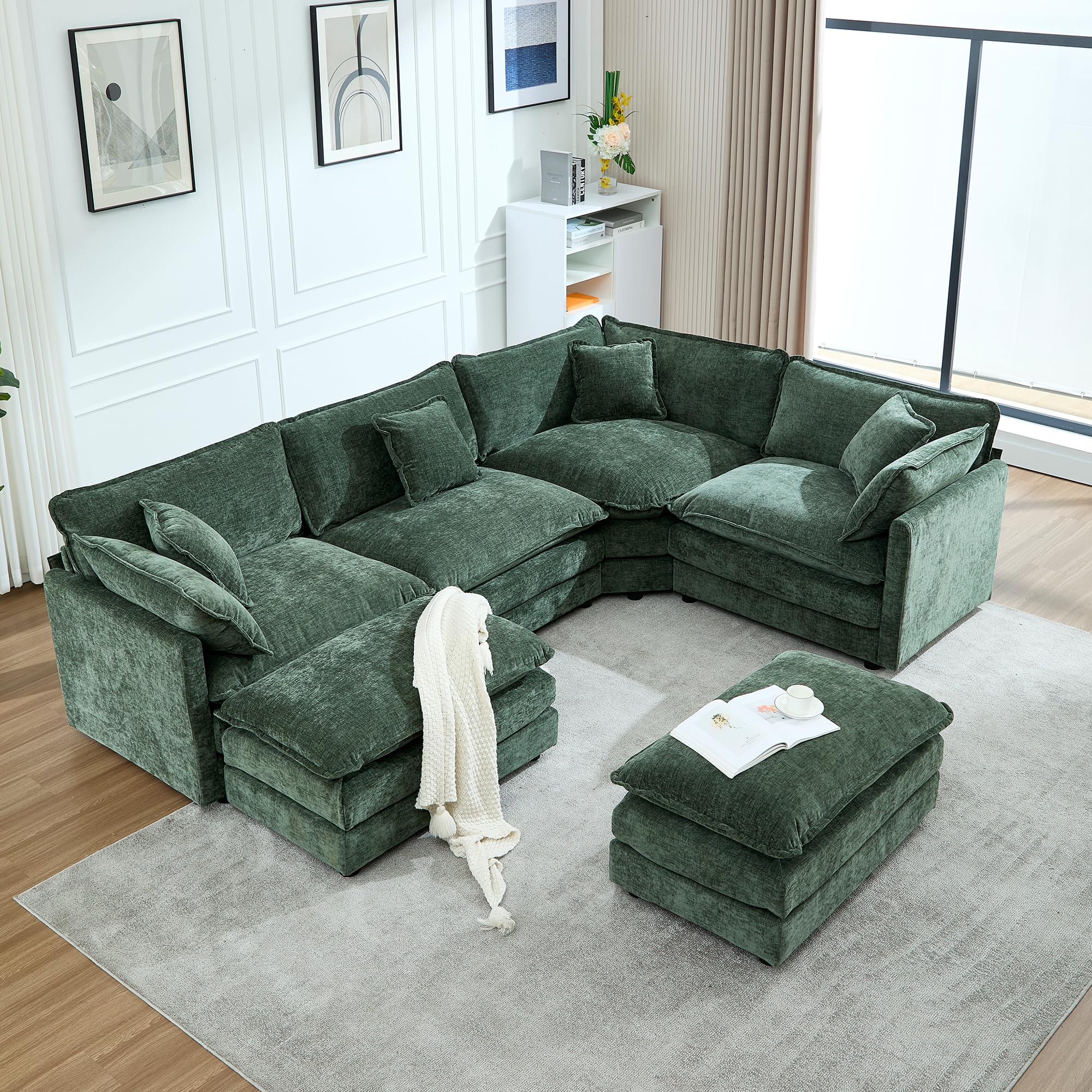 Davanti view of the GNIXUU Modular Sectional Sofa in green chenille, arranged in a large L-shape with an accompanying ottoman, in a modern living room.