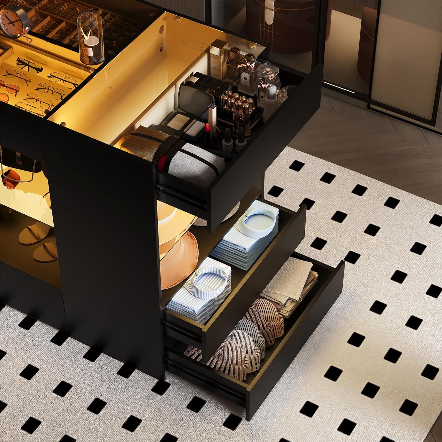 Open drawers of the closet island revealing organized clothing and accessories.