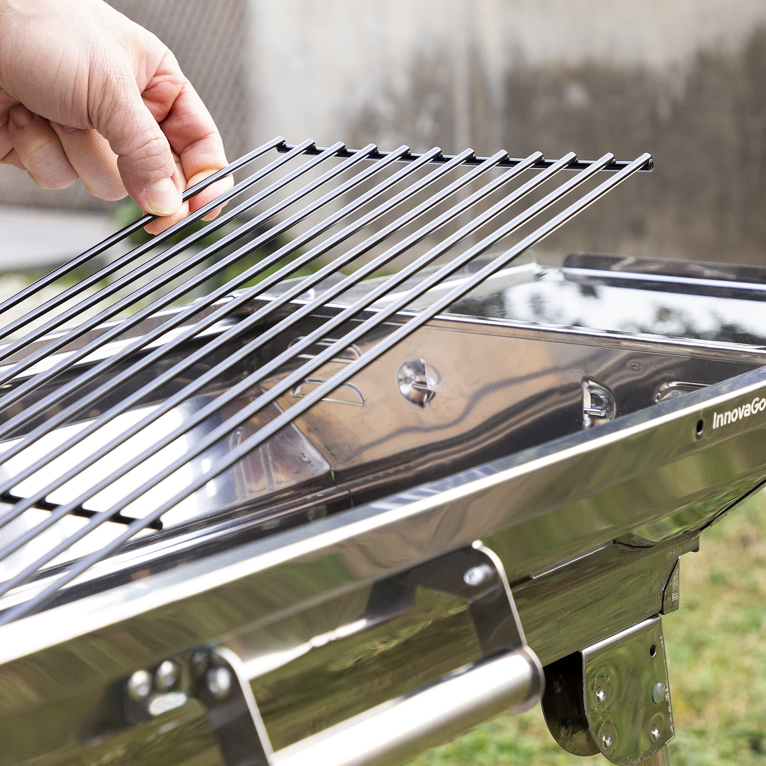 InnovaGoods® Zusammenklappbarer Holzkohlegrill aus Edelstahl, Tragbar, Leicht zu reinigen, ideal für Picknicks, Camping, Garten, Strand. Rostfreier Stahl.
