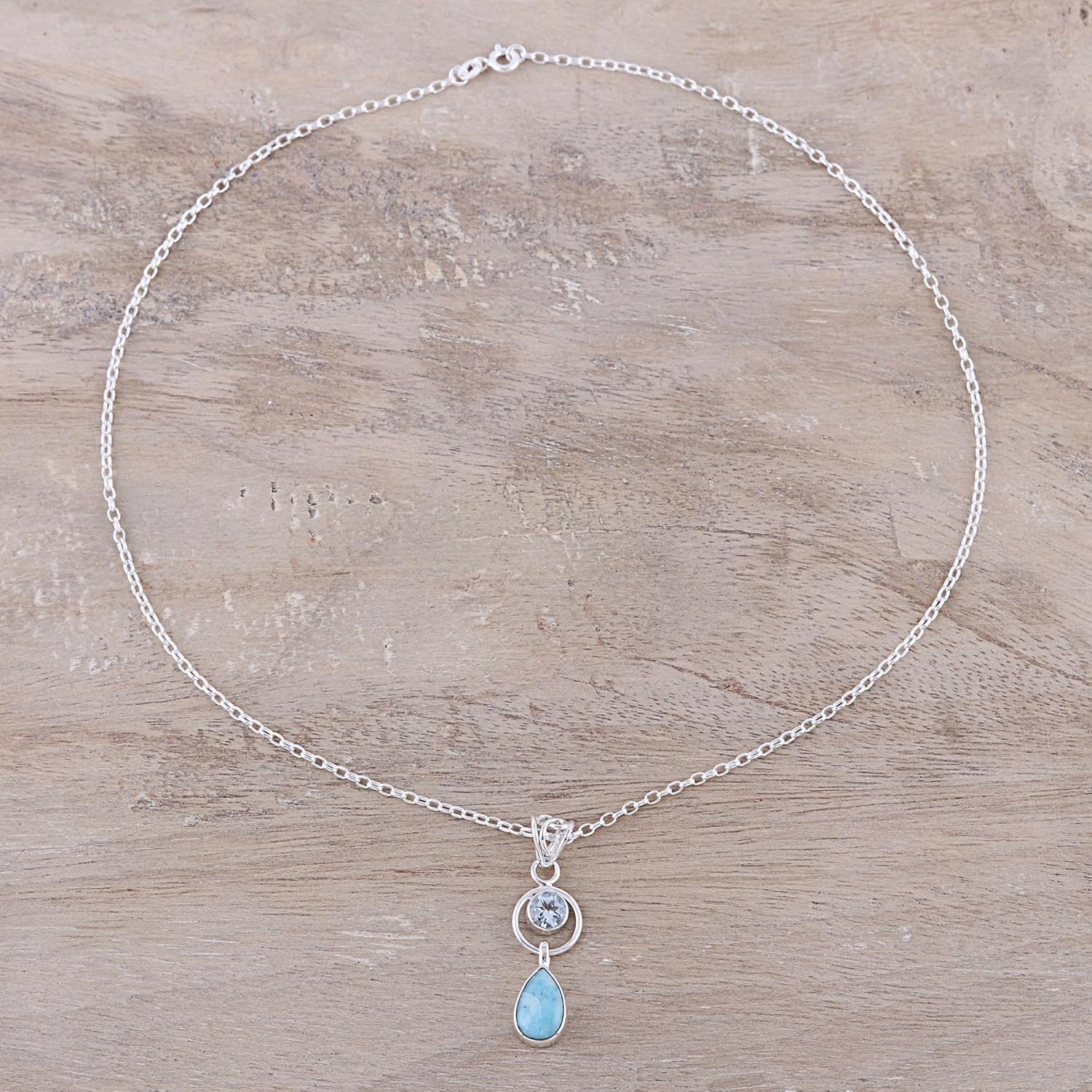 NOVICA Artisan Handmade Larimar Blue Topaz Pendant Necklace from India Sterling Silver Birthstone Gemstone [18 in L 2 mm W Pendant(s) 1.5 in L x 0.4 in W x 0.2 in D] ' Gleaming Daylight'