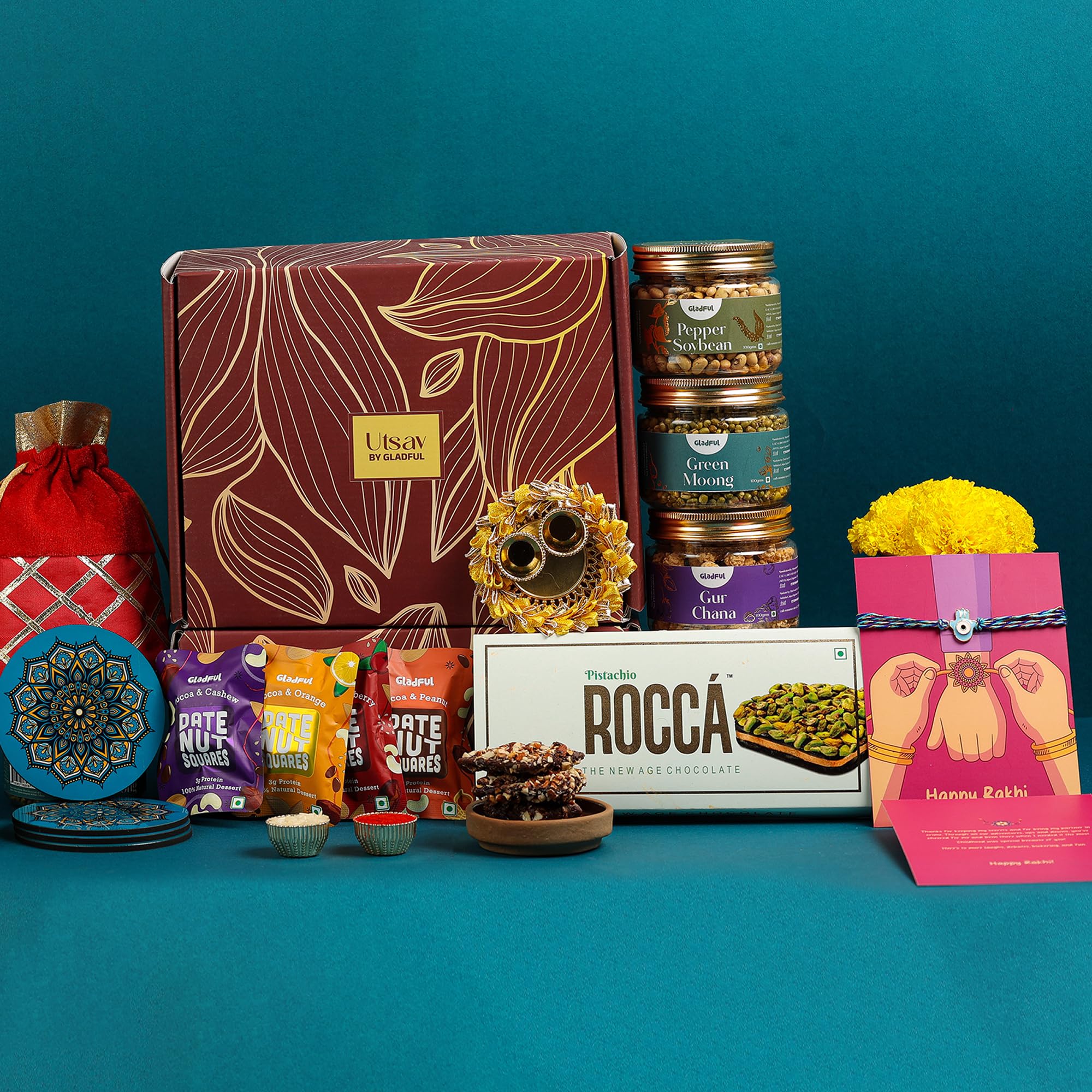 Gladful Rakhi Gift For Brother, 13 Item Utsav Rakhi Gift Box with 3 Roasted Snack, 4 Date Nut Square, Evil Eye Rakhi with Roli Chawal and Costers Pack, Rakhi Hampers (B0D7WFK47V) Amazon Price History, Amazon Price Tracker