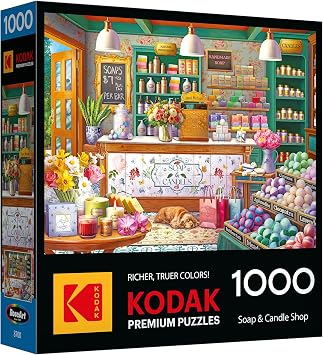 RoseArt - Kodak Premium - 1000 Piece Jigsaw Puzzle for Adults Soap & Candle Shop Cozy Boutique with Flowers, Candles & Bath Bombs Relaxing Home Decor Scene 26.625 x 19.25 Inches