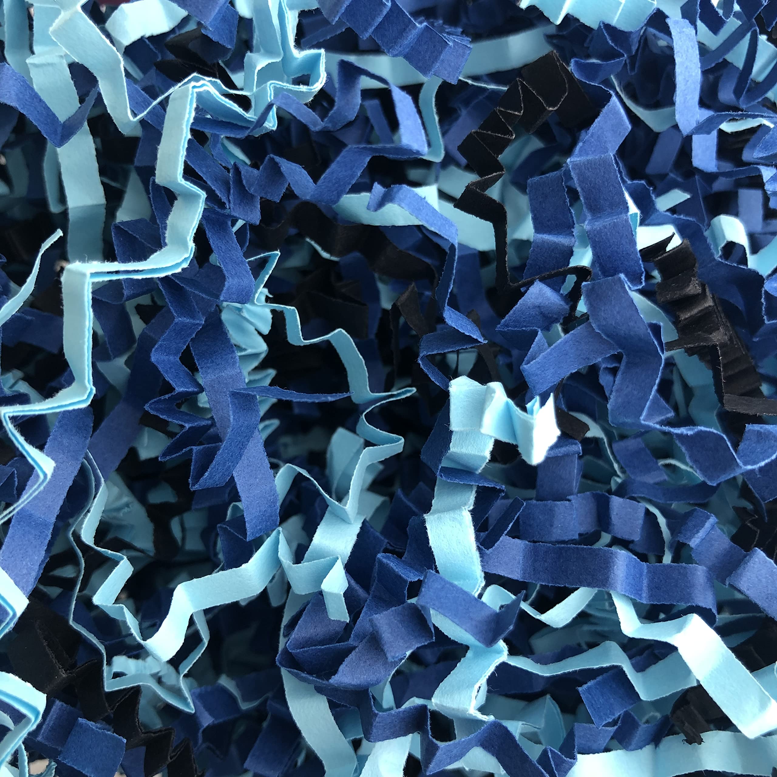ShredAstic ® Shredded Paper Zig Zag Crinkle Cut Blue shades/black Mix gifts baskets hampers crafts (100 grams)