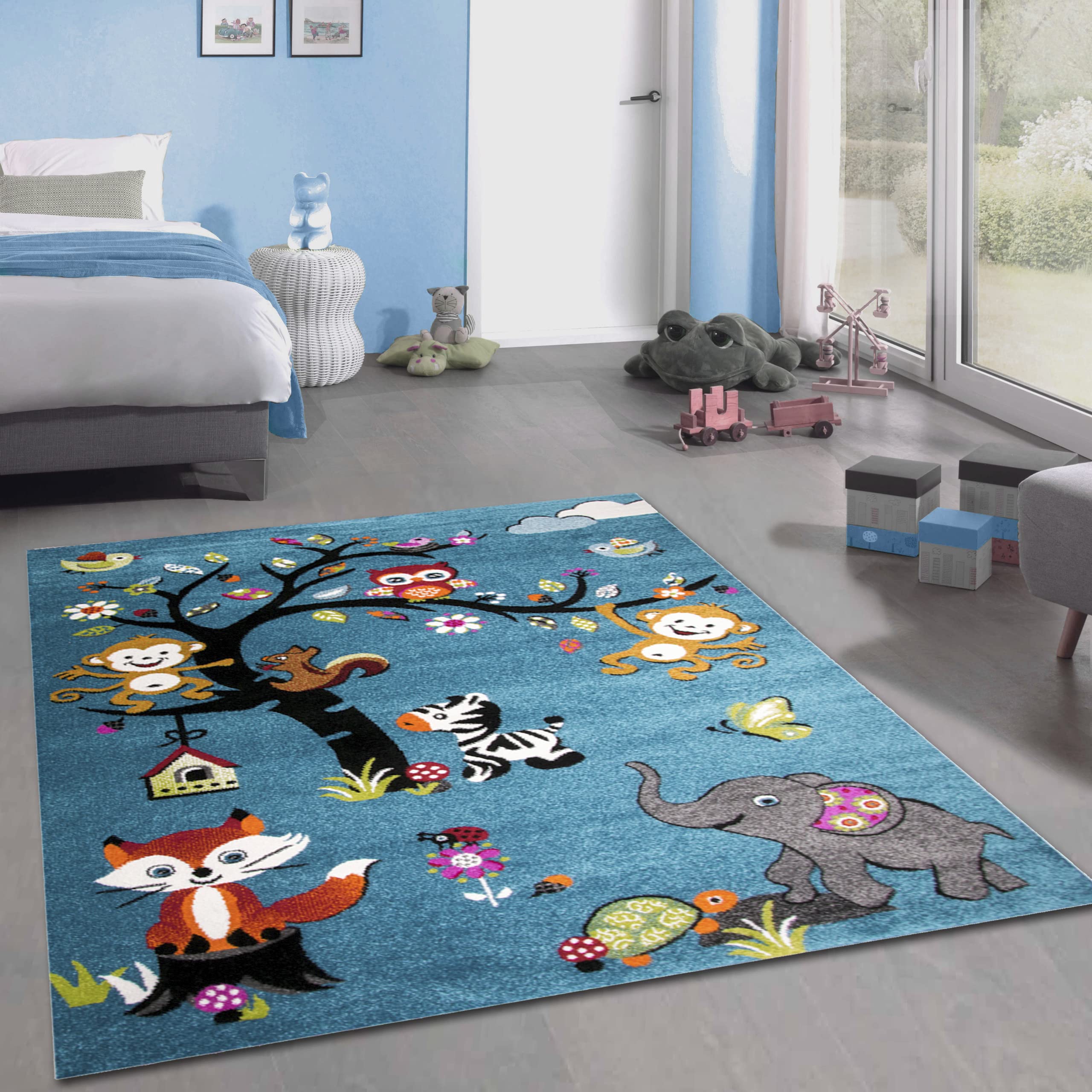 Tapis enfant CARPETIA bleu pour éveiller l'imagination des petits