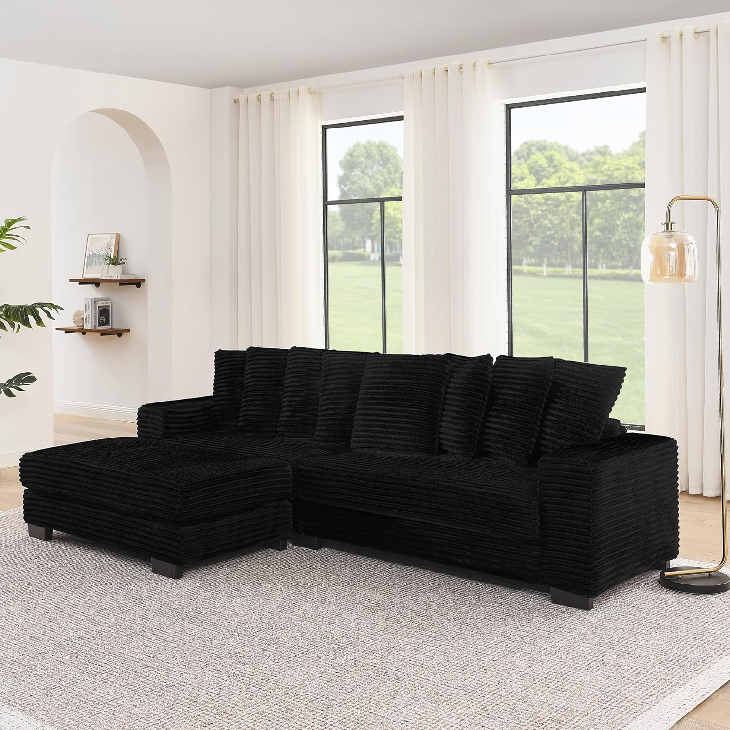 Angled view of Niccae Corduroy Sectional Sofa with chaise on the left