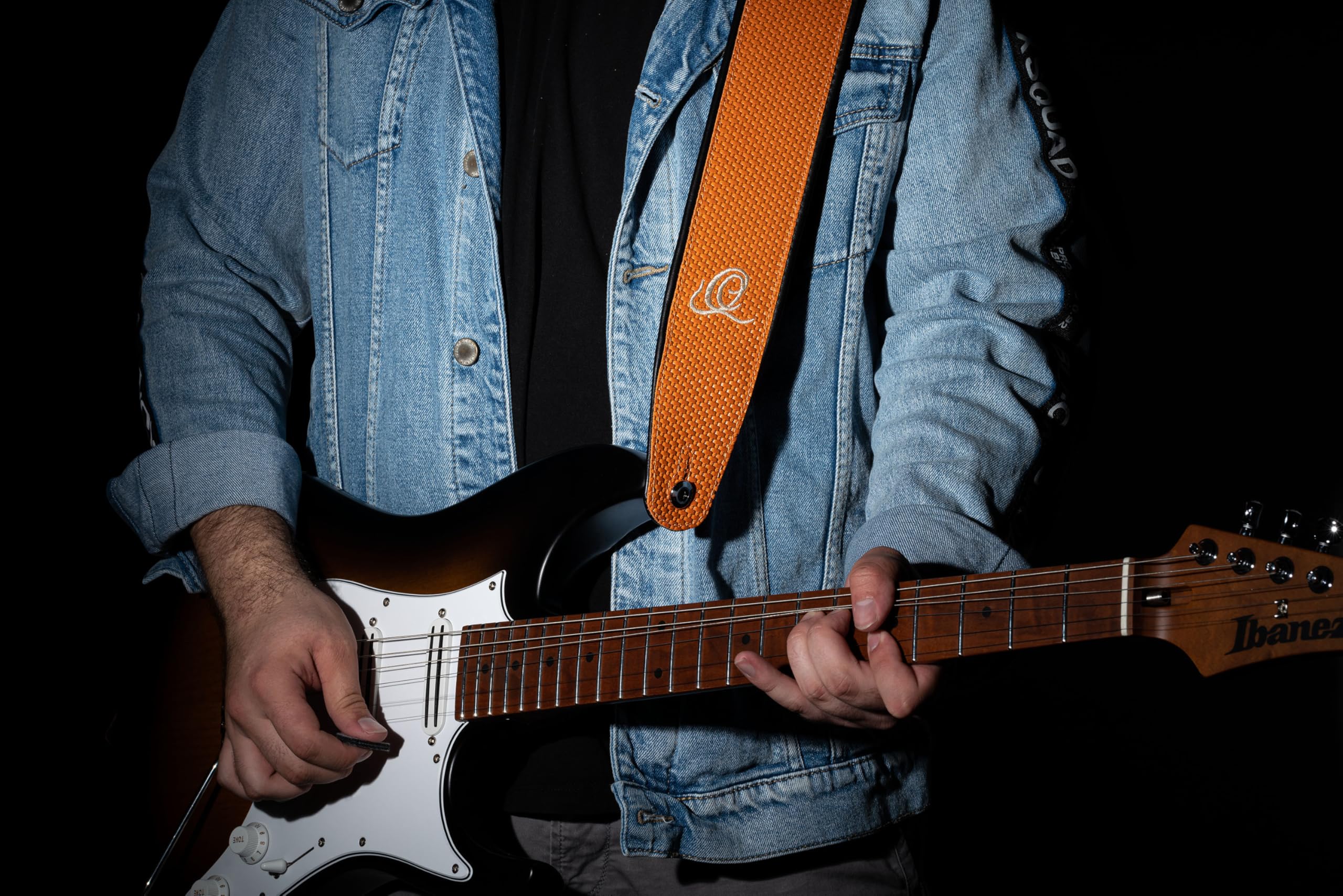 Ortega Guitars Gitarrengurt Länge Verstellbar - Akustik Gitarre / Bass, E-Gitarre, E-Bass - Custom Series - Echtleder, Orange Braid (OSCU-6)