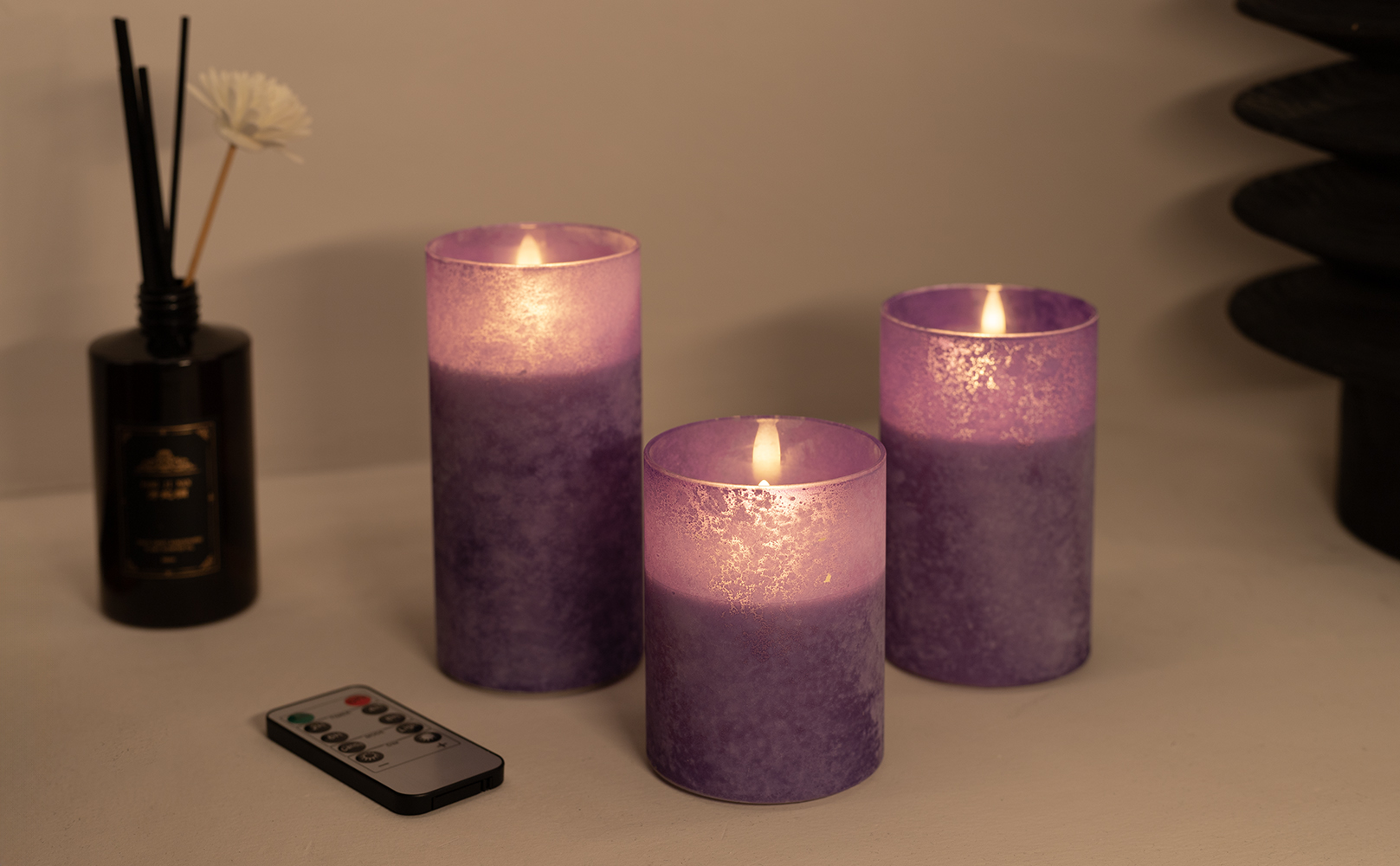 Image of Purple Flameless Candles Remote Timer Halloween Decor Set of 3 | Purple Sandblasted Glass, Warm White LED Glow, Real Wax, 10 Key Remote, 2 4 6 8 Hour Timer, 3 Sizes
