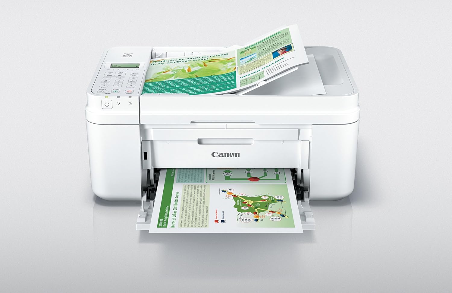 Szczyt view of the Canon PIXMA MX492 Wireless All-in-One Printer with paper loaded in the top feeder.