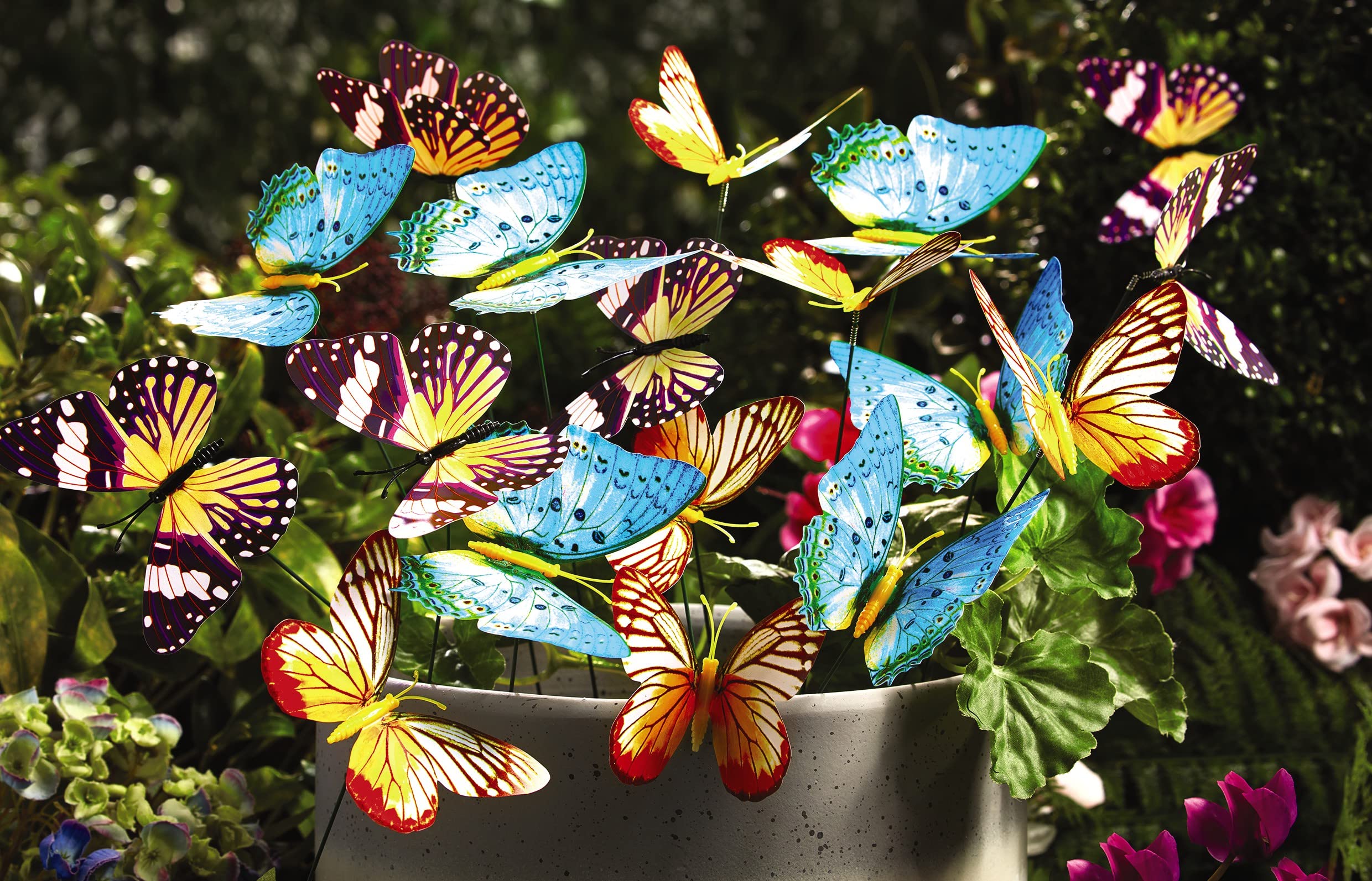 18 x Glow in the Dark Butterfly Ornaments – Indoor Outdoor Bright Colourful Butterflies on Steel Stakes – 3D Effect Garden Plant Flower Pot or Border Decorations – Each Butterfly 8.5 x 7cm