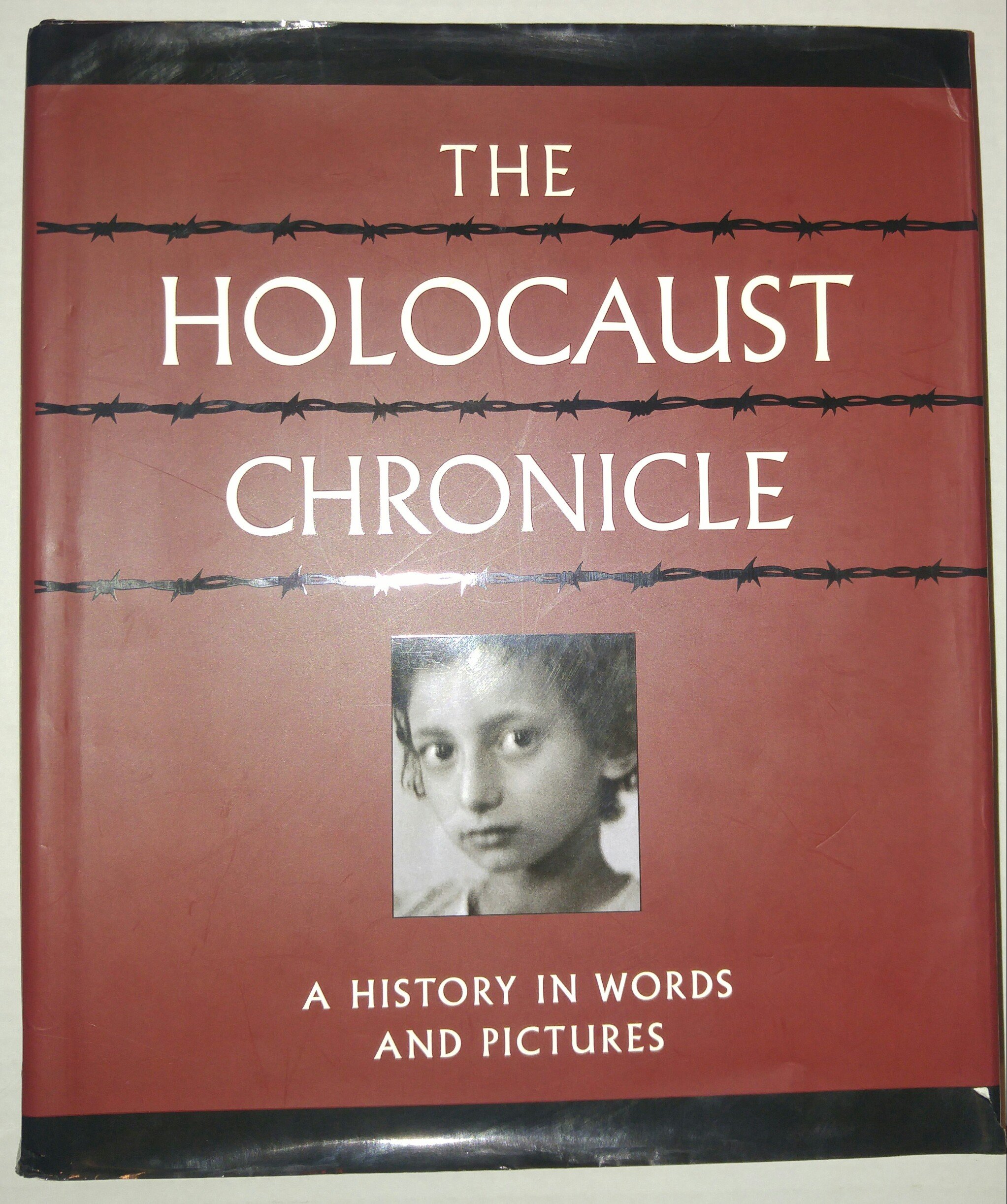 The Holocaust Chronicle: A History in Words and Pictures