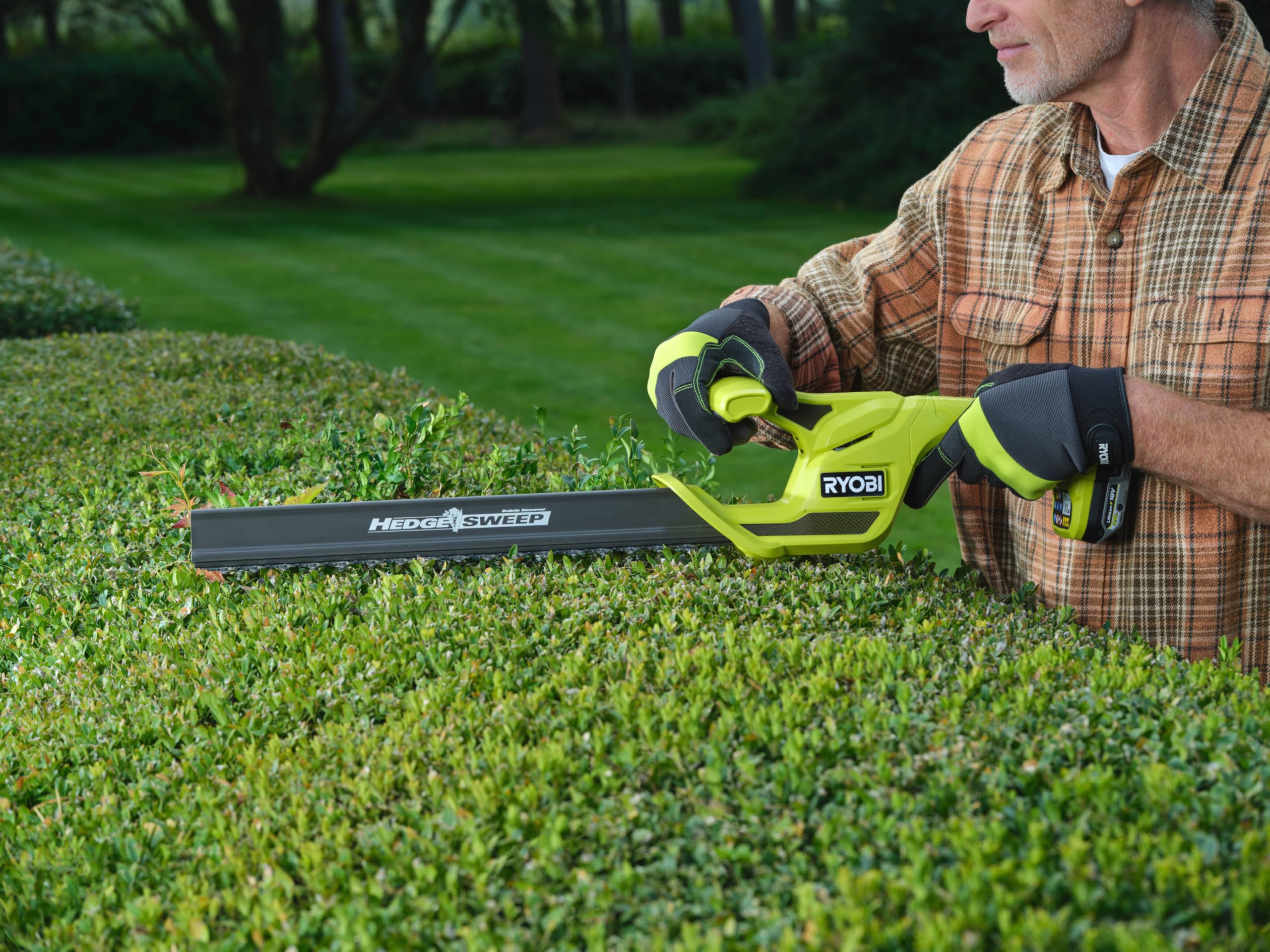 RYOBI 18 V ONE + akumulatorowe nożyce do żywopłotu RY18HT40B-0, długość brzeszczotu 40 cm, bez akumulatora i ładowarki