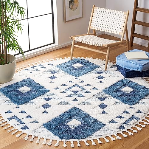 SAFAVIEH Moroccan Tassel Shag Collection Area Rug - 8' Round, Blue & Ivory, Boho Design, 2-inch Thick Ideal for The Living Room, Bedroom, Dining Room (MTS688M-8R)