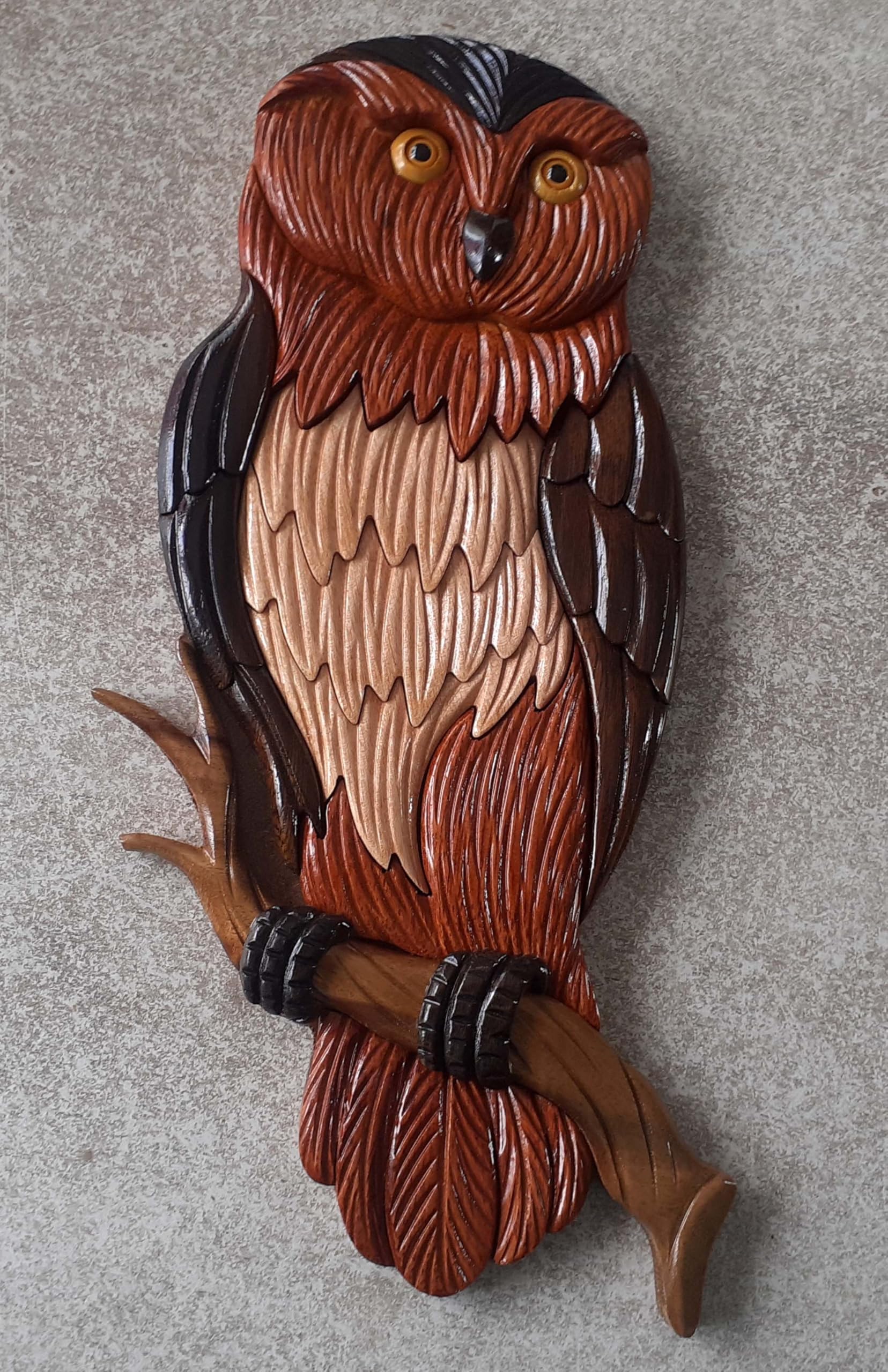 Figurine de la chouette pour créer une ambiance zen sur une étagère