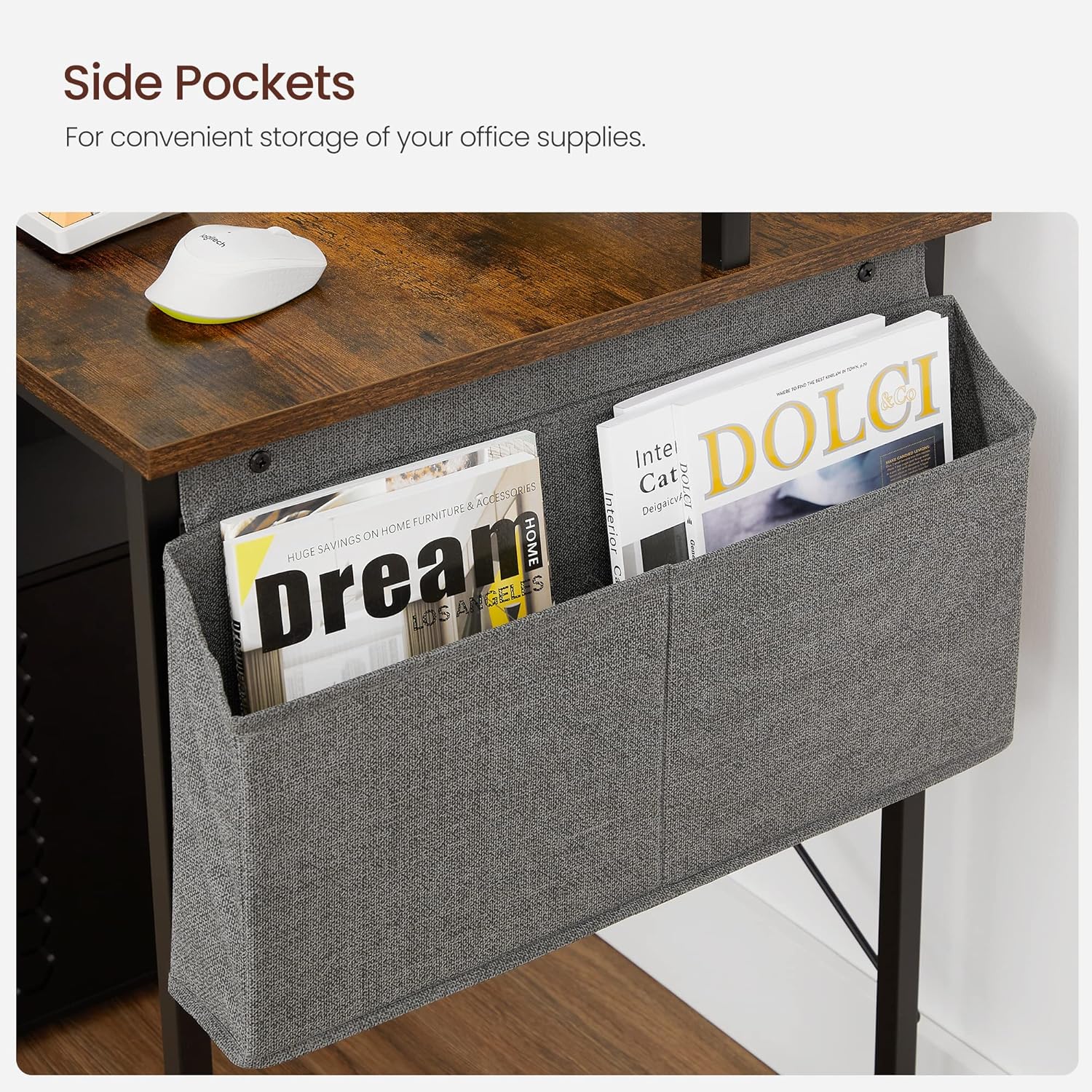 Close-up view of the fabric storage bag attached to the side of the desk, filled with magazines and notebooks.